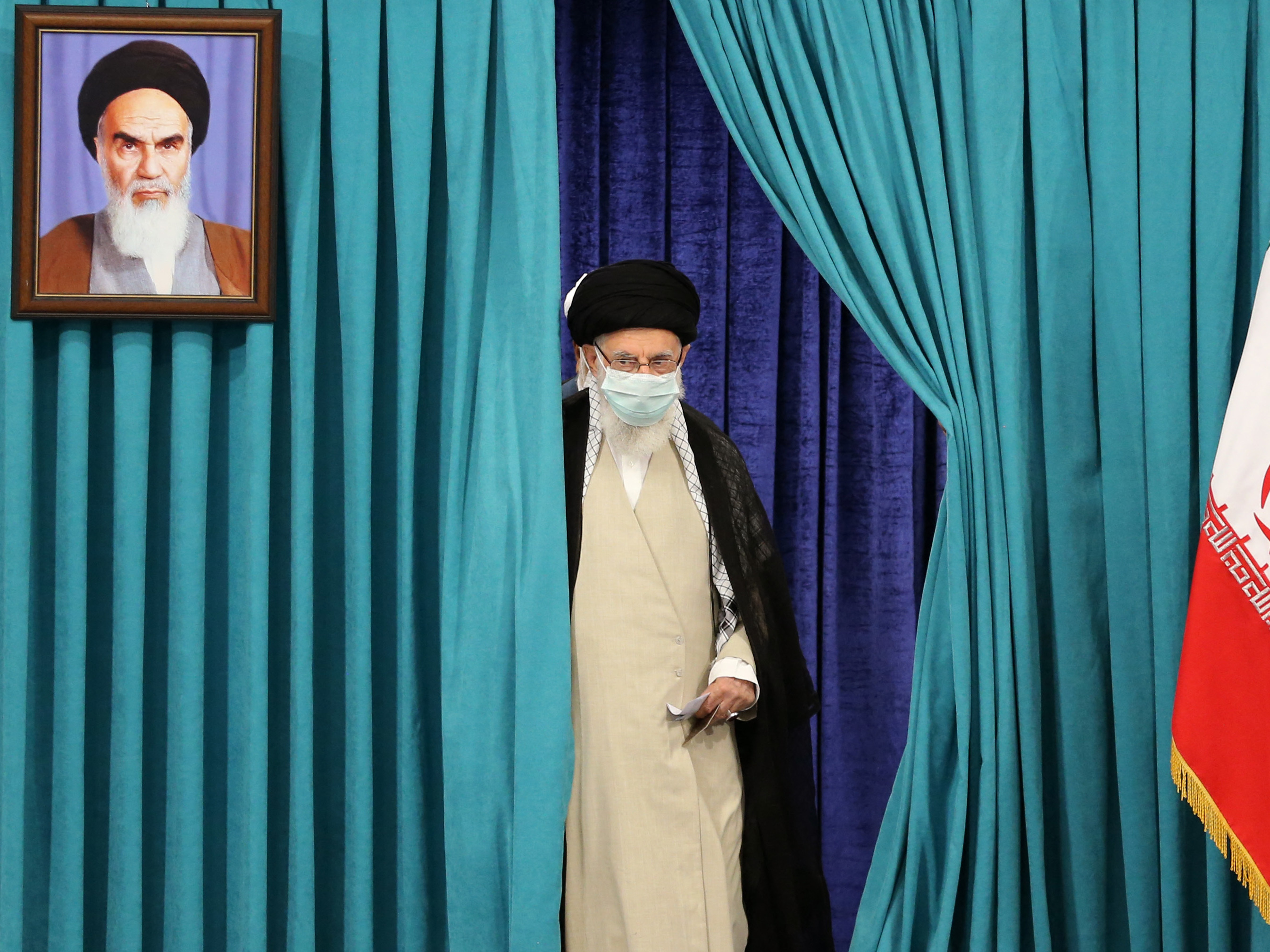Iranian supreme leader killed in Israeli airstrike 4 Ali Khamenei wears a mask due to the COVID-19 pandemic as he arrives to cast his ballot during Iran's presidential election on June 18, 2021.