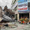 Strong Taiwan earthquake traps people and derails a train