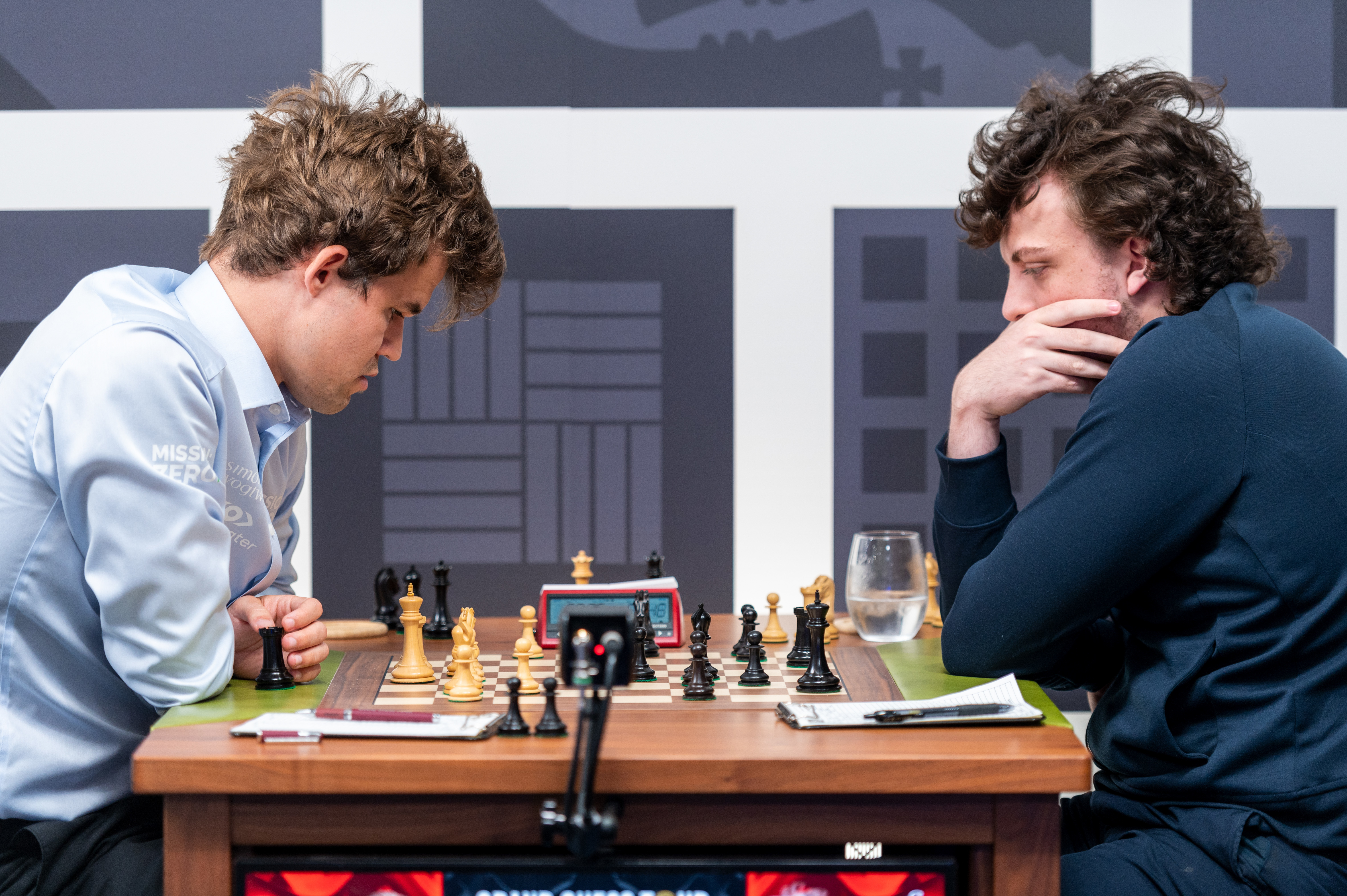 Magnus Carlsen (left) and Hans Niemann face off at the Sinquefield Cup in St. Louis on Sept. 4. The two had a rematch on Monday, but Carlsen only played one move before resigning from the game. (Grand Chess Tour)