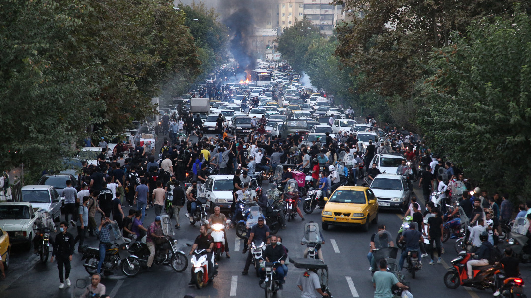 A picture obtained by AFP outside Iran on Sept. 21 shows Iranian demonstrators in Tehran during a protest for Mahsa Amini, days after she died in police custody.