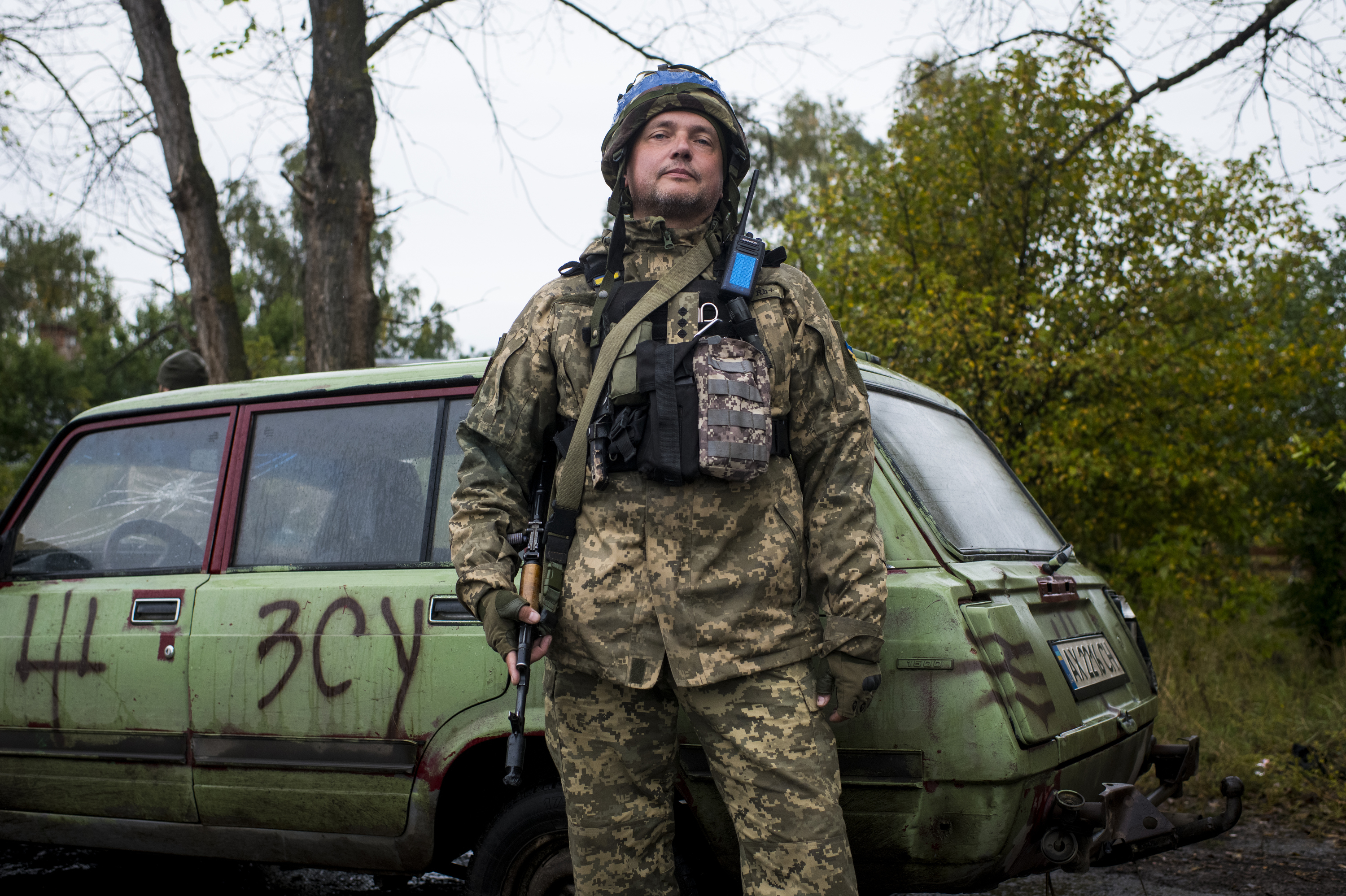 A soldier who was formerly an IT entrepreneur and asked to be identified only by his call sign &quot;Arun&quot; manning a checkpoint in Borshchova, in northeastern Ukraine, on Friday. Ukrainian troops took back the area from Russian forces earlier this month. (Pete Kiehart for NPR)