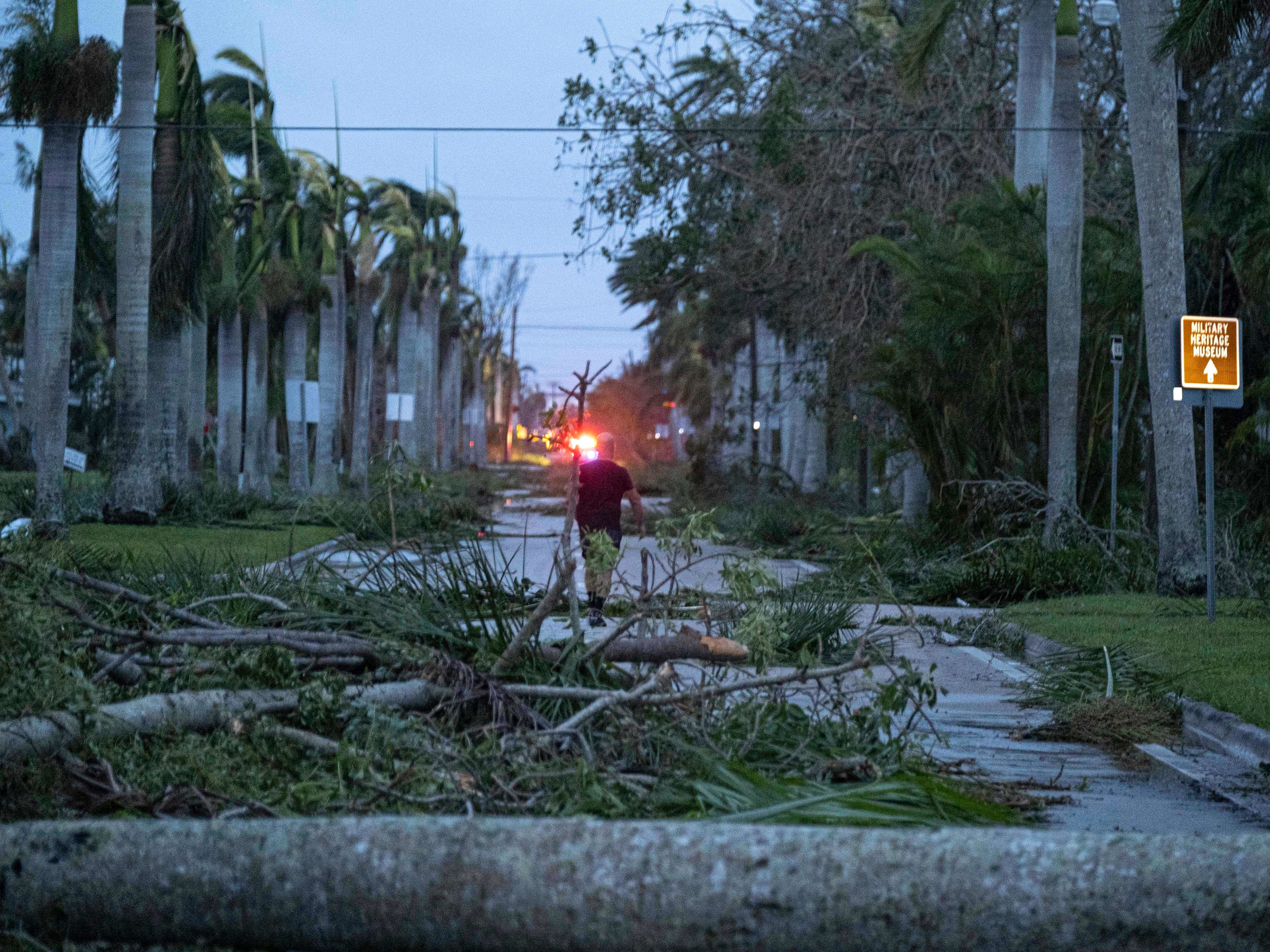 Hurricane Ian left debris in Punta Gorda, Fla., after it made landfall. Storms like Ian are more likely because of climate change. (AFP via Getty Images)