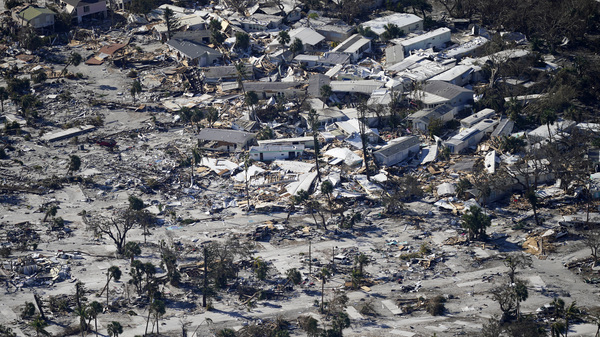 In this aerial photo made in a flight provided by mediccorps.org, damage from Hurricane Ian is seen on Estero Island in Fort Myers Beach, Fla., on Friday.
