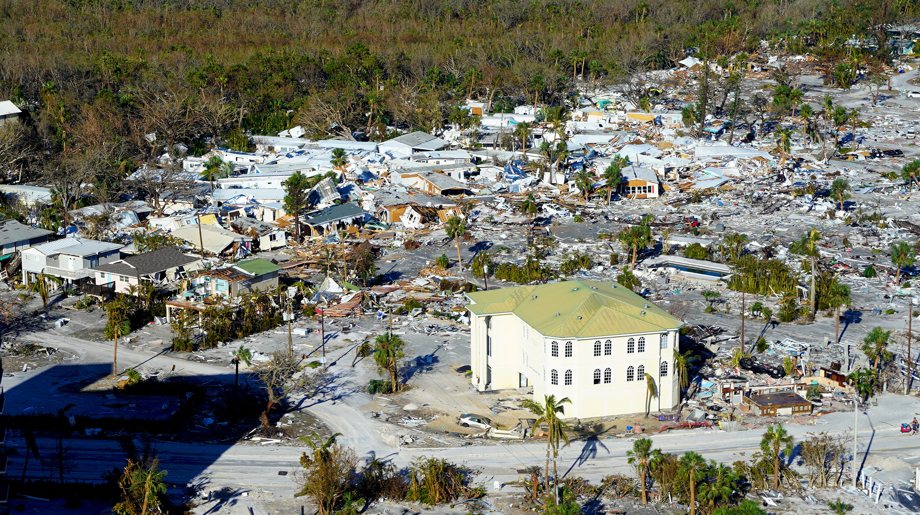 The devastation on Fort Myers Beach is clear in a view south of Matanzas Pass Preserve. (Thomas James for WGCU/NPR)