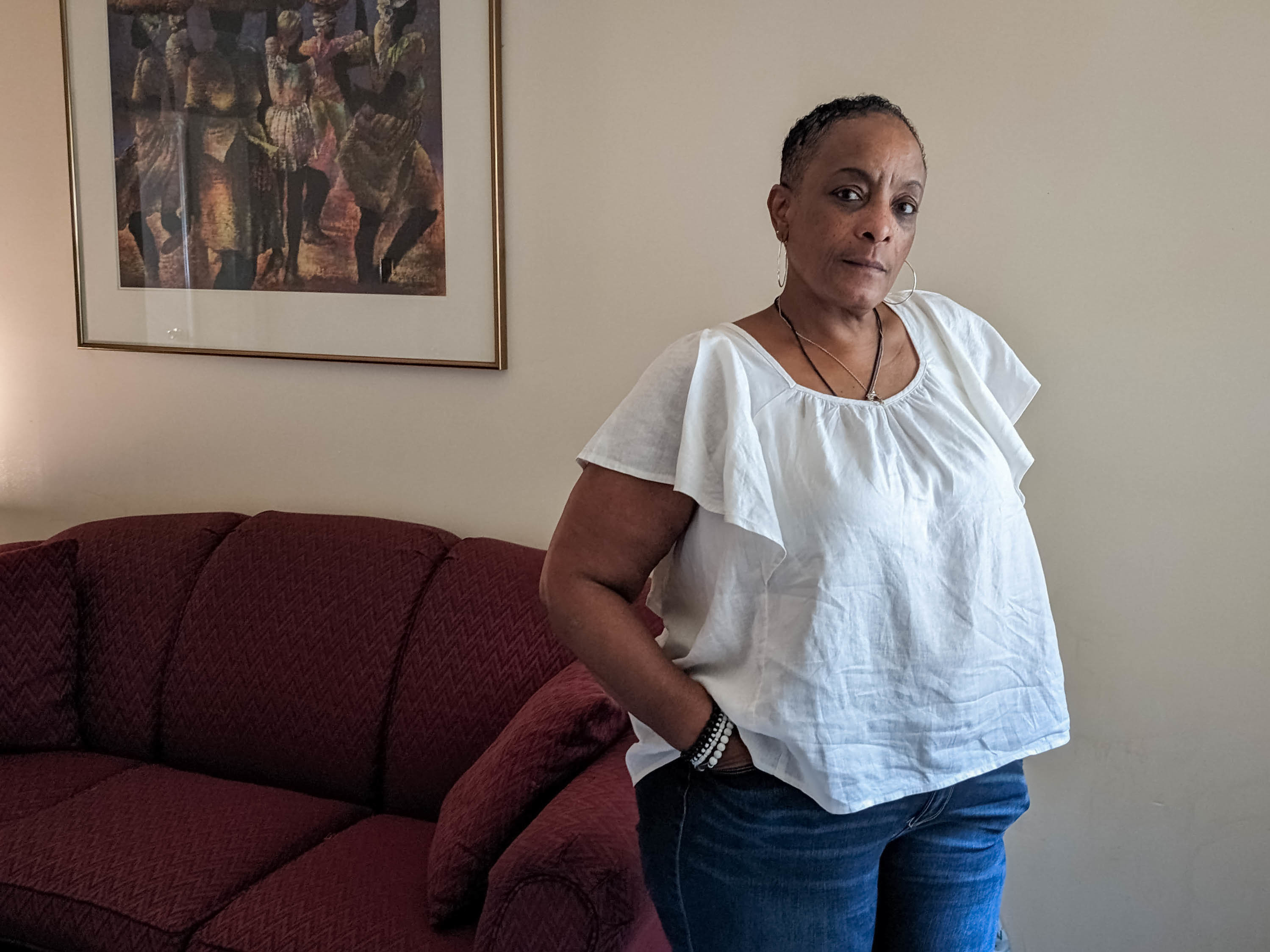 Penelope Wingard of Charlotte, N.C., has survived breast cancer, a brain aneurysm and surgery on both eyes. For the past eight years, she's also been battling tens of thousands of dollars in medical debt. (Aneri Pattani/ KHN)