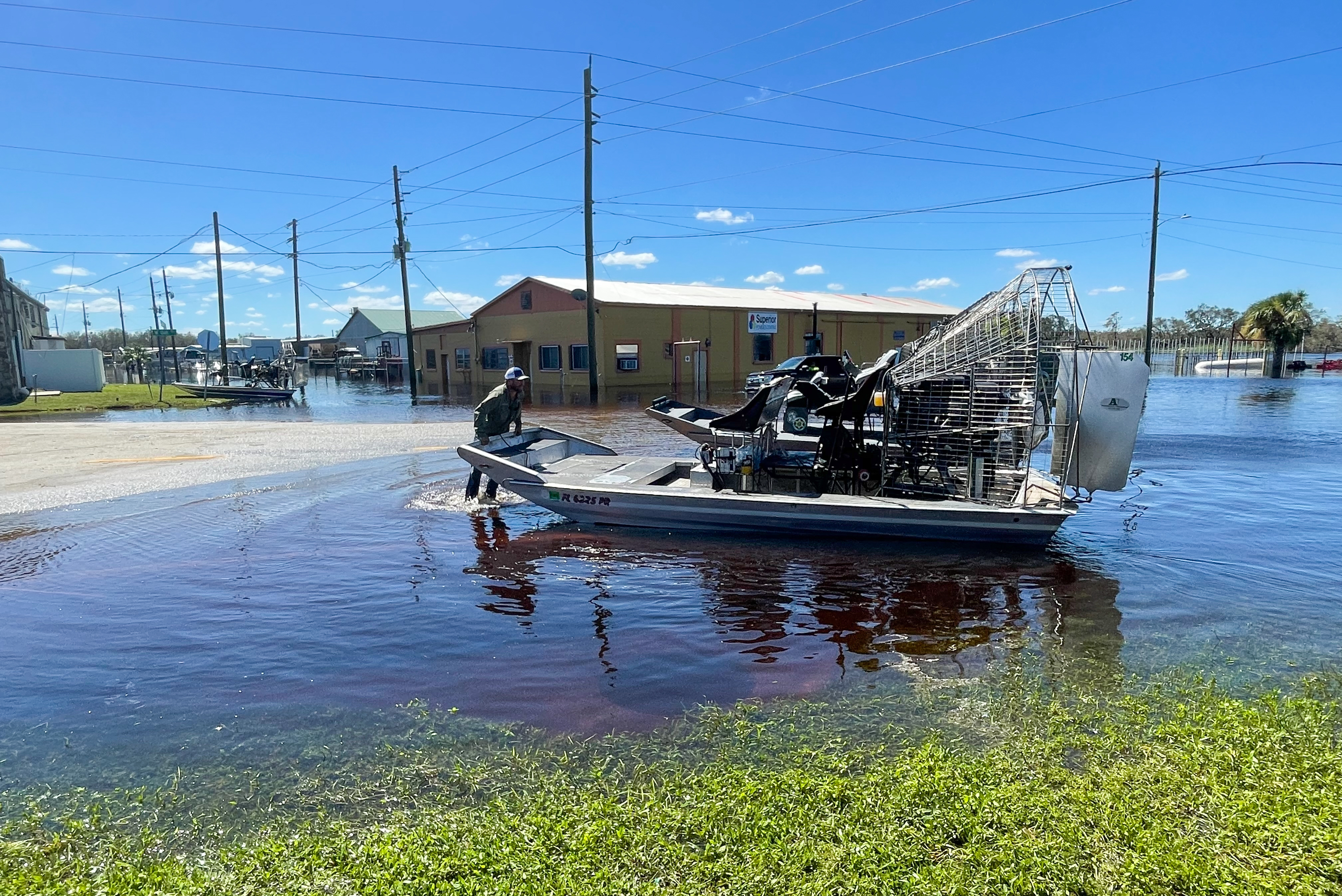 DeSoto County Commissioner J.C. Deriso turns his airboat around before heading out to help hurricane survivors stranded on newly-created islands brought on by the flooding Peace River. (NPR)