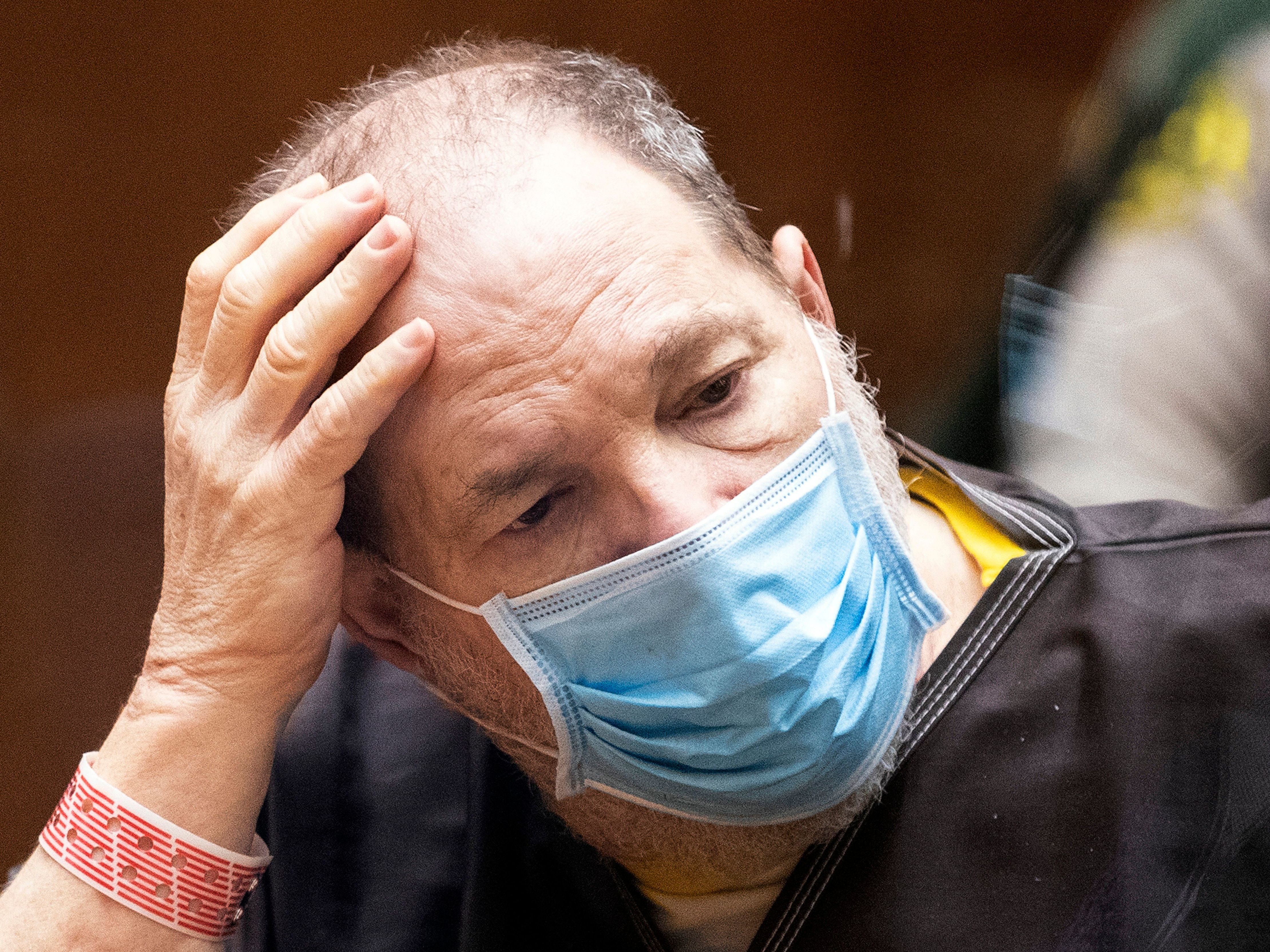 Former film producer Harvey Weinstein listens in court during a pre-trial hearing in Los Angeles.