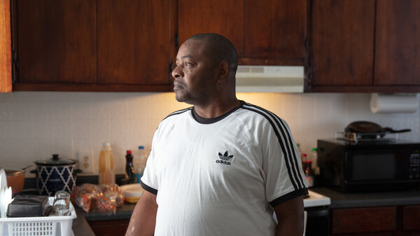 Eric Perkins says the kitchen is what sold him on the two-bedroom, one-bathroom apartment in Norfolk, Va., that he found through a shared housing program.