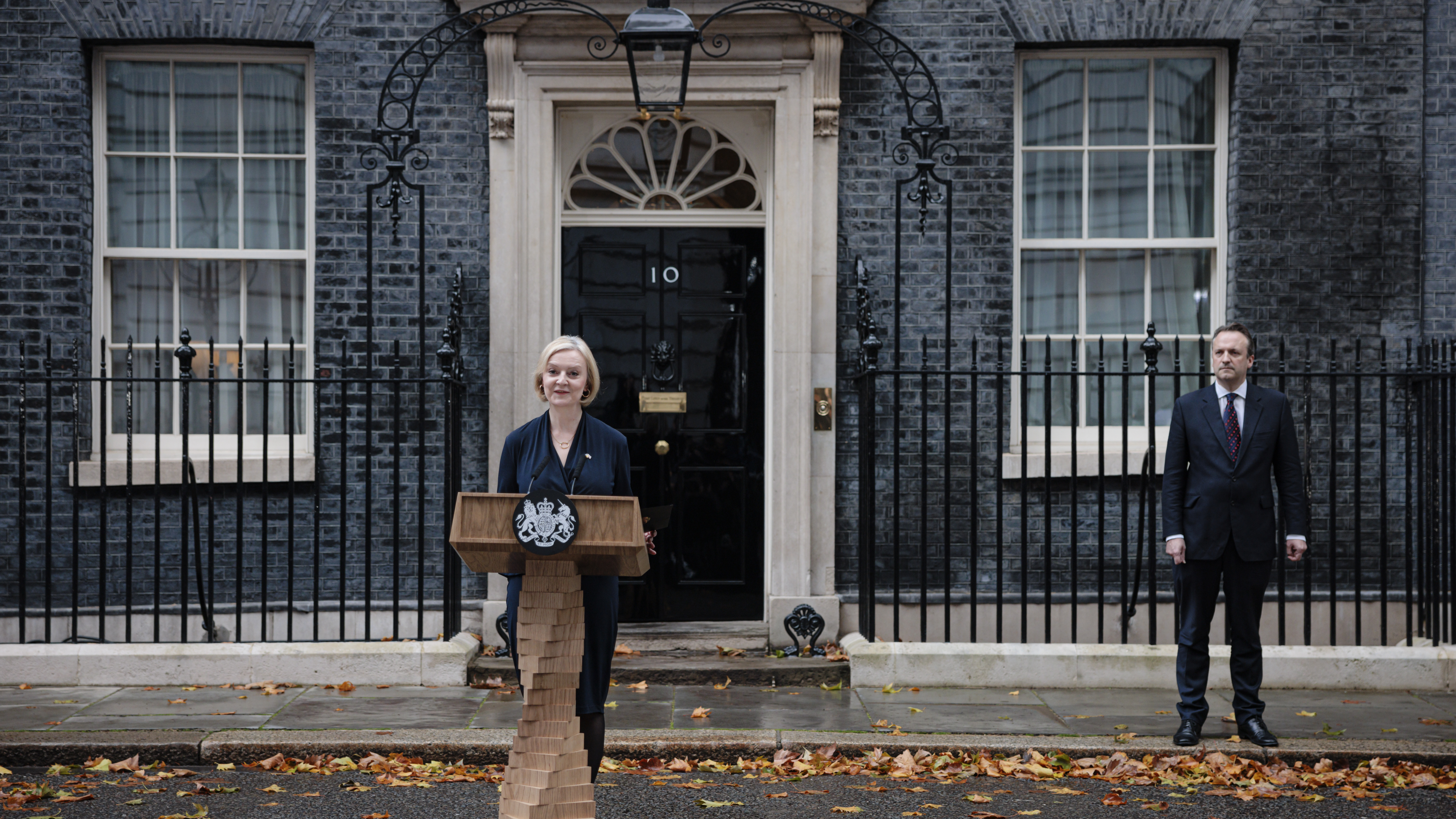 Prime Minister Liz Truss delivers her resignation speech as her husband, Hugh O