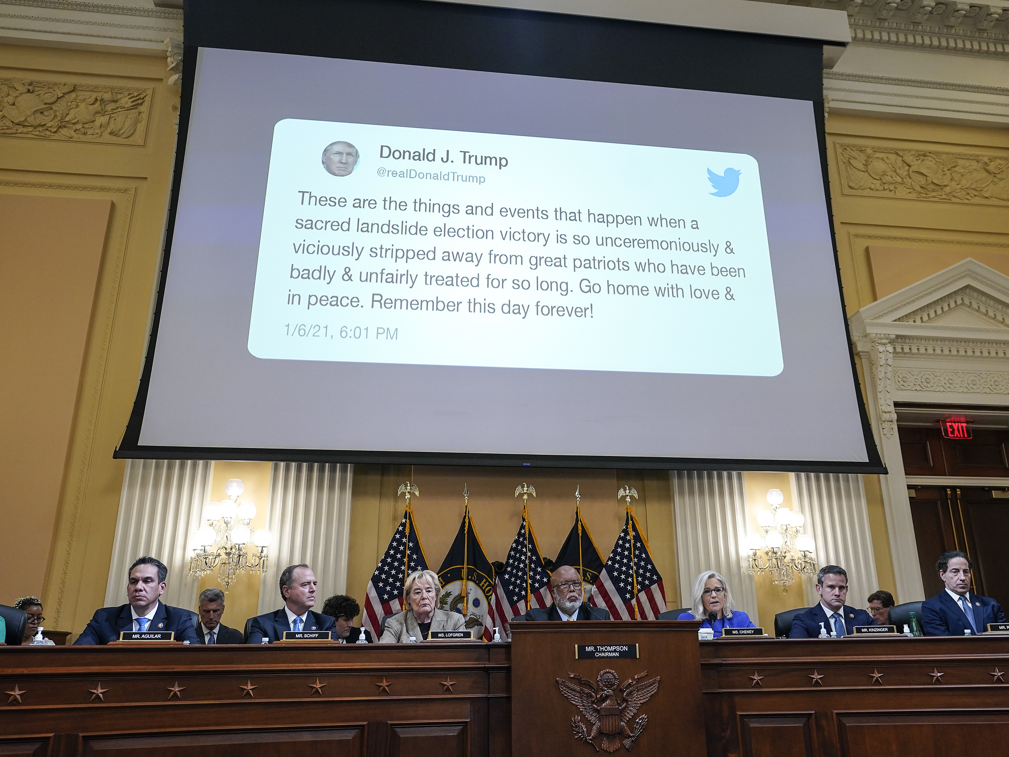 A tweet by former President Donald Trump is displayed on a screen during a hearing held by the House Jan. 6 committee on June 9. (Getty Images)