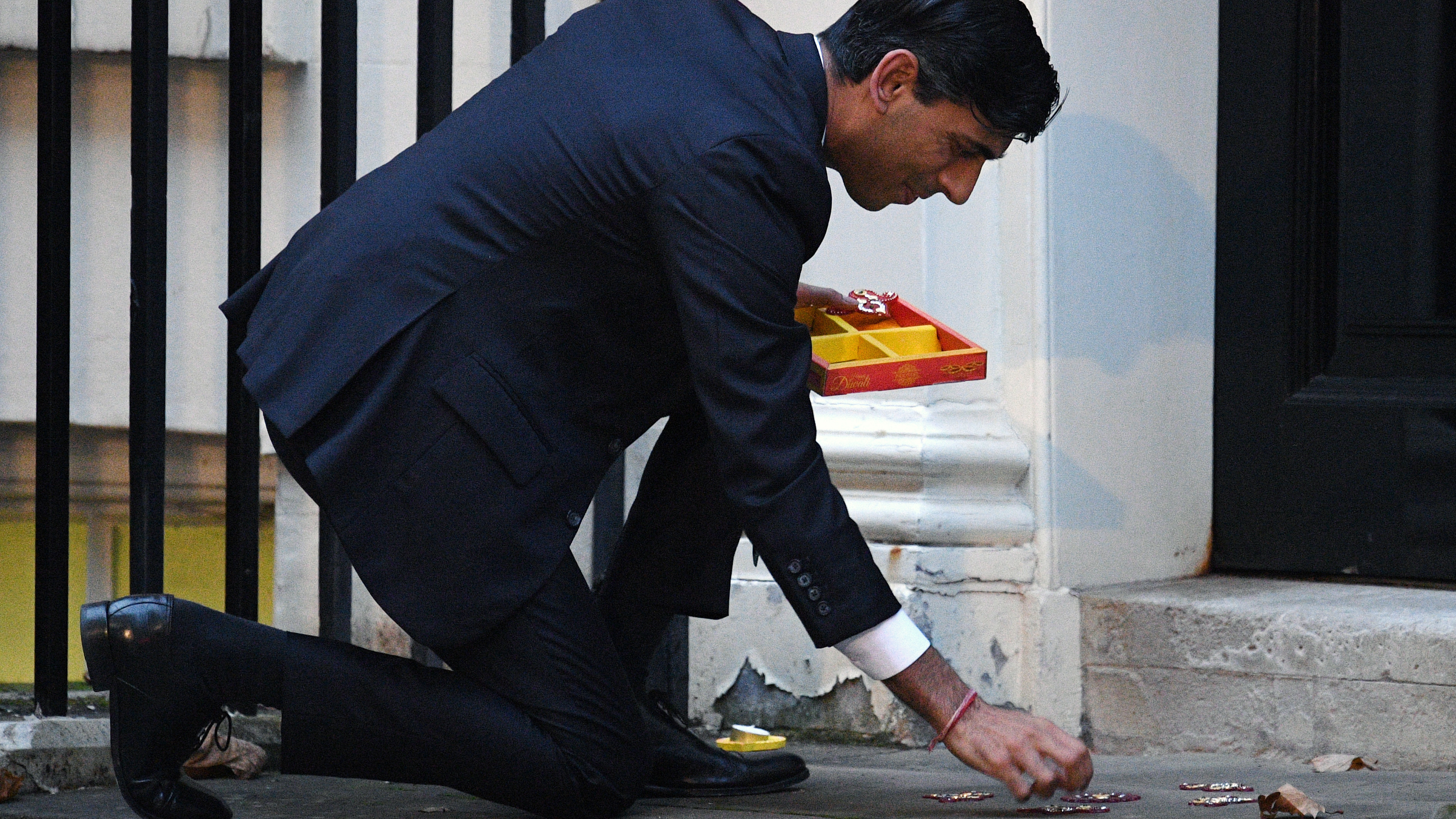 Rishi Sunak lights a candle for Diwali in Downing Street on Nov. 12, 2020 in London.