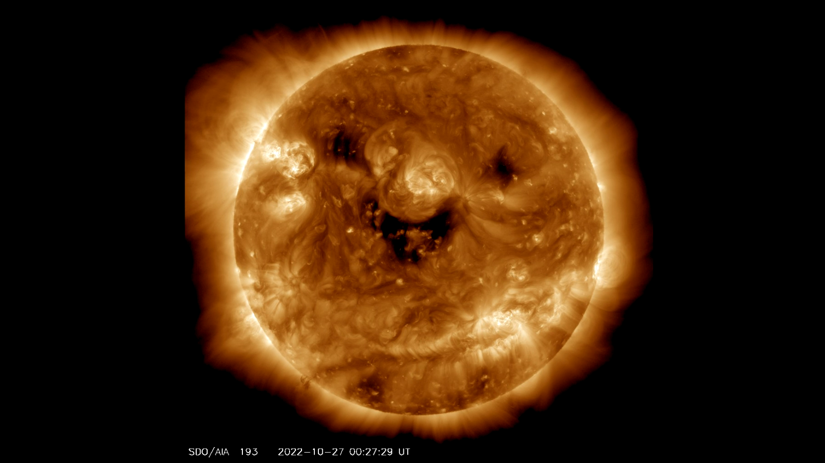 NASA caught the sun smiling down on us, but the grin could signal a solar  storm