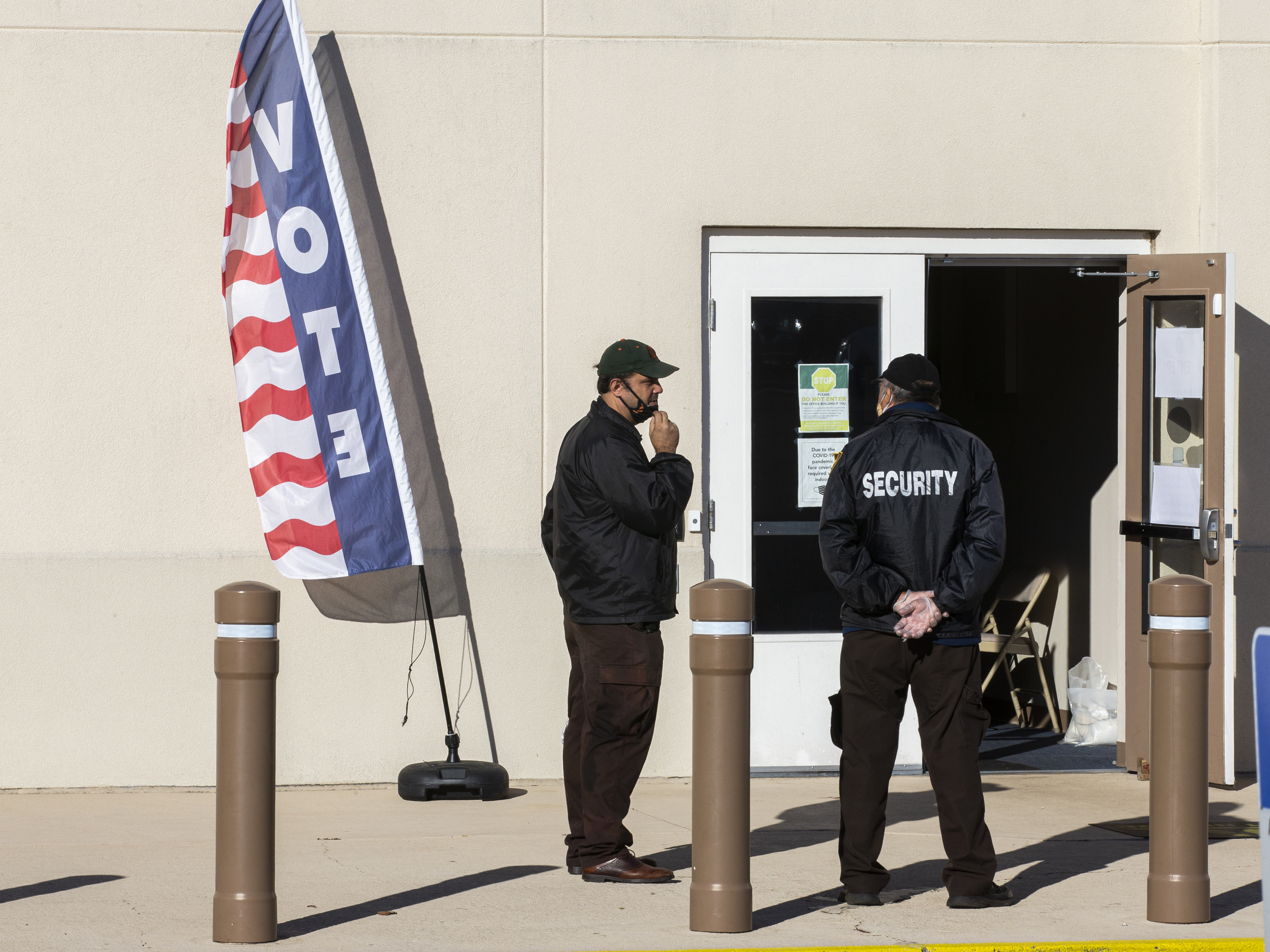 Security personnel wait for voters outside the Leon County Supervisor of Elections office on Nov. 3, 2020, in Tallahassee, Fla. (Getty Images)