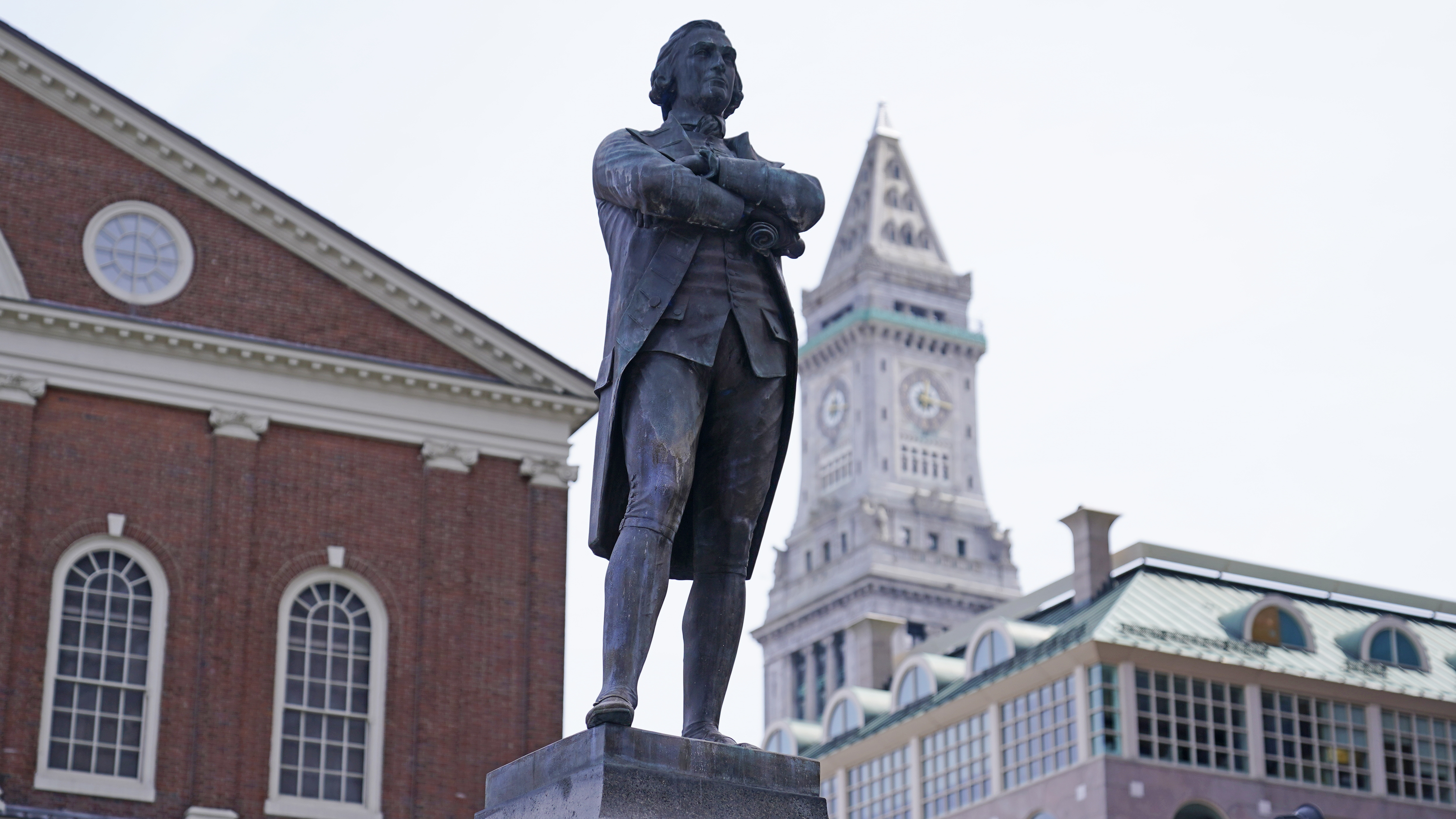 The statue of Samuel Adams stands outside Boston