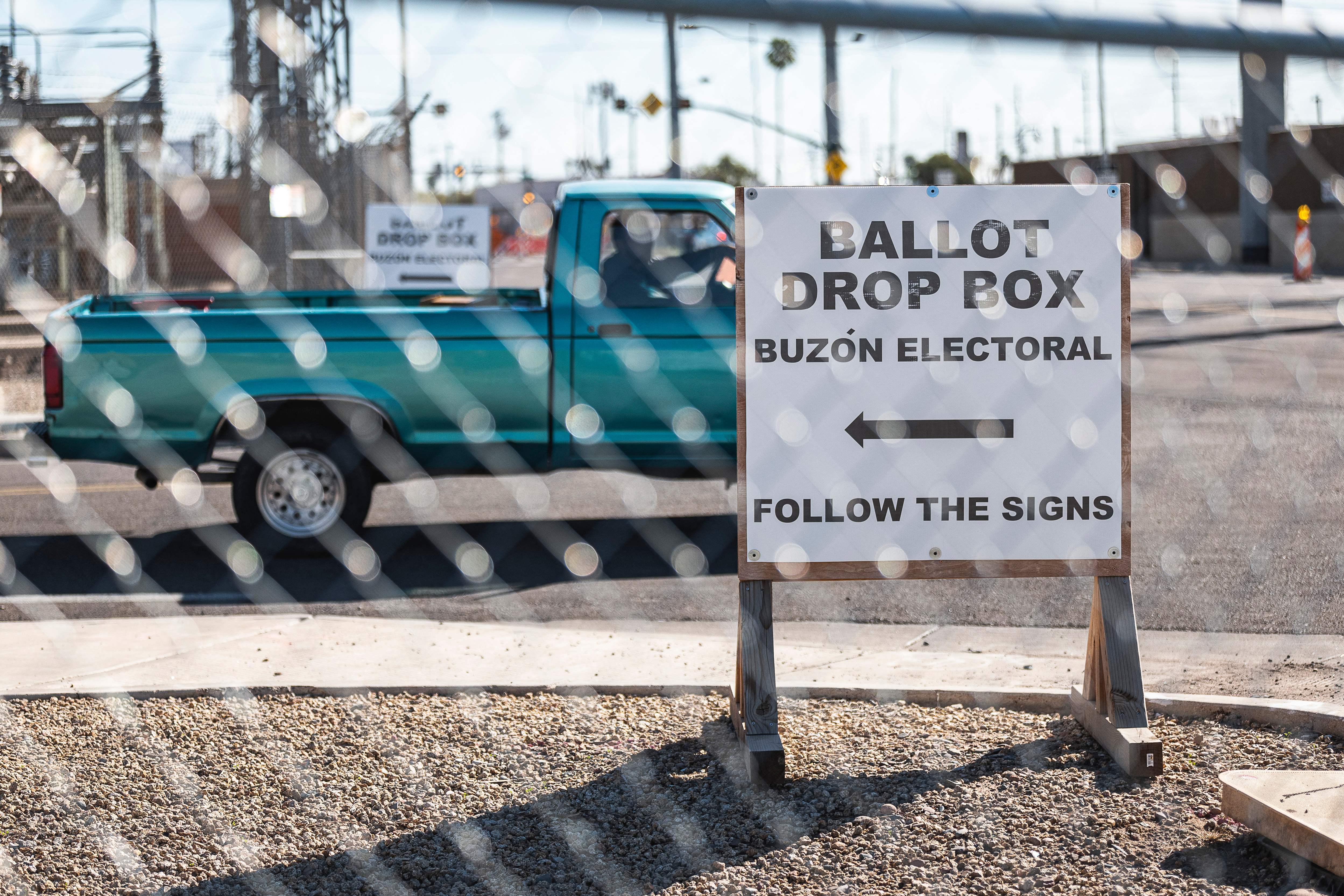 Fences surround the Maricopa County Tabulation and Elections Center (MCTEC) in Phoenix, Arizona, on Oct. 25, 2022, to help prevent incidents and pressure on voters at the ballot drop box. (AFP via Getty Images)