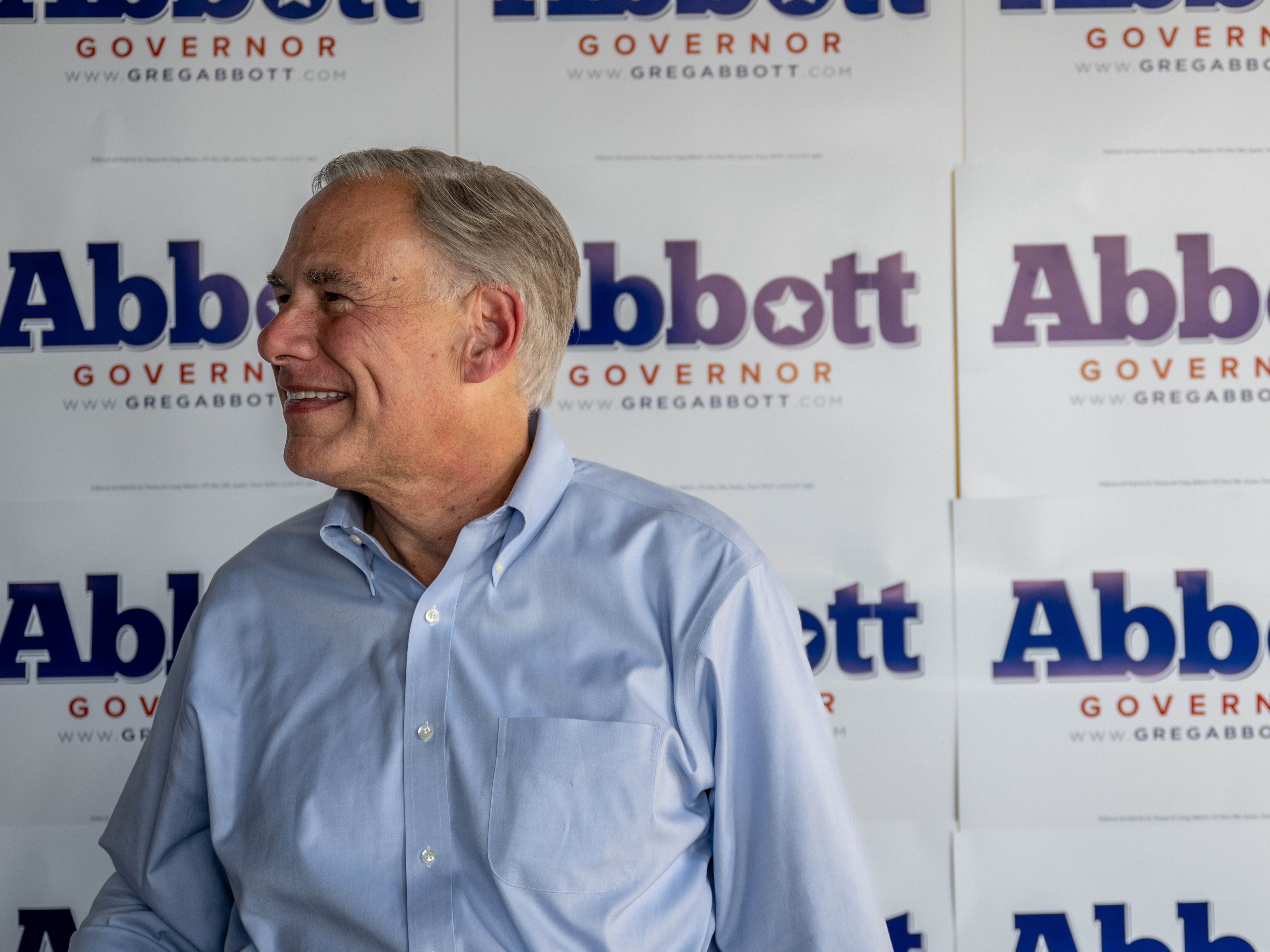 Texas Gov. Greg Abbott waits to take pictures with supporters at the conclusion of a 'Get Out The Vote' rally at the Fuzzy's Pizza & Italian Cafe on October 27, 2022 in Katy, Texas. (Getty Images)