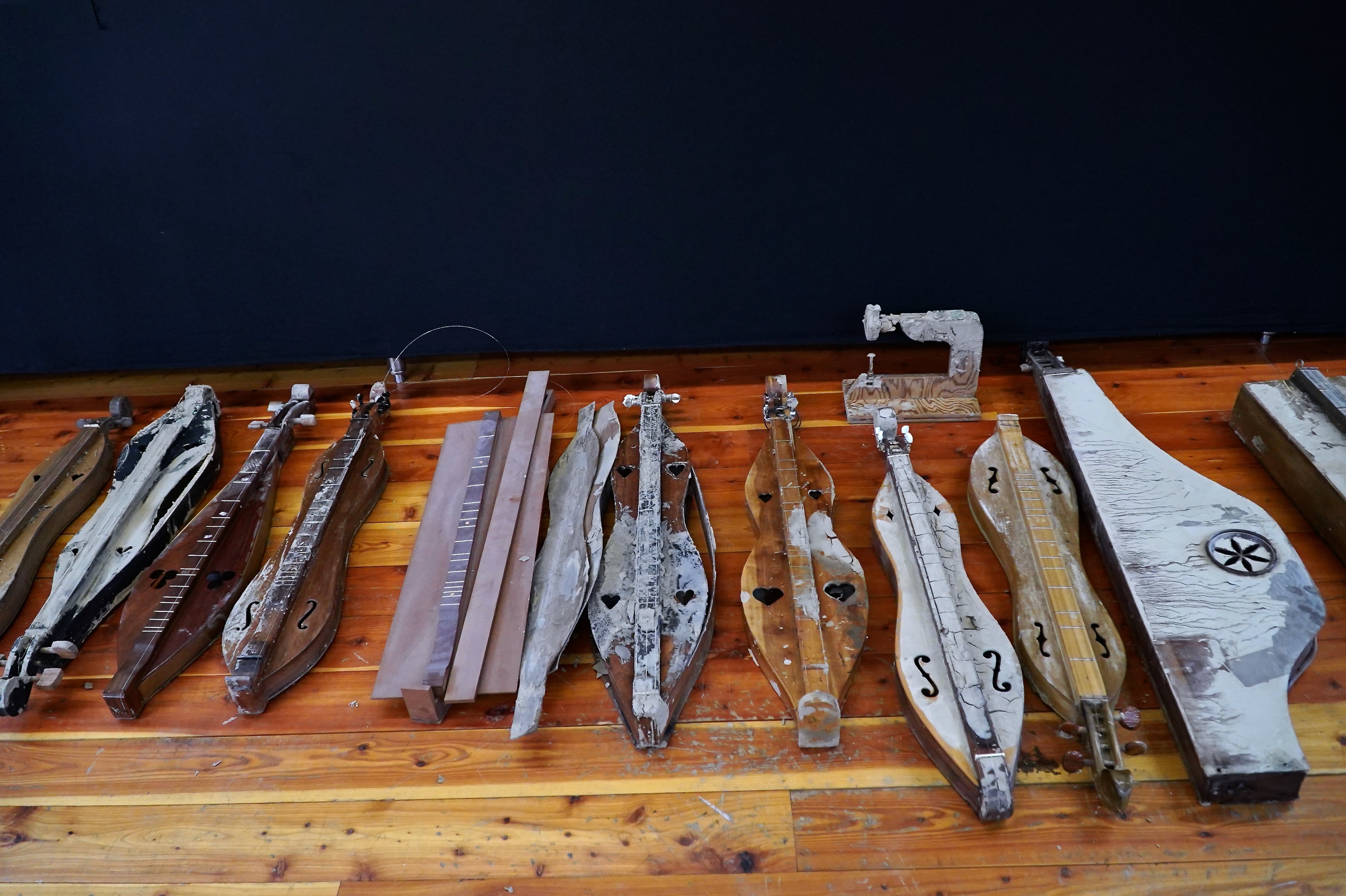 Damaged instruments from the Museum of the Mountain Dulcimer line the upper floor of Hindman's Appalachian Artisan Center.