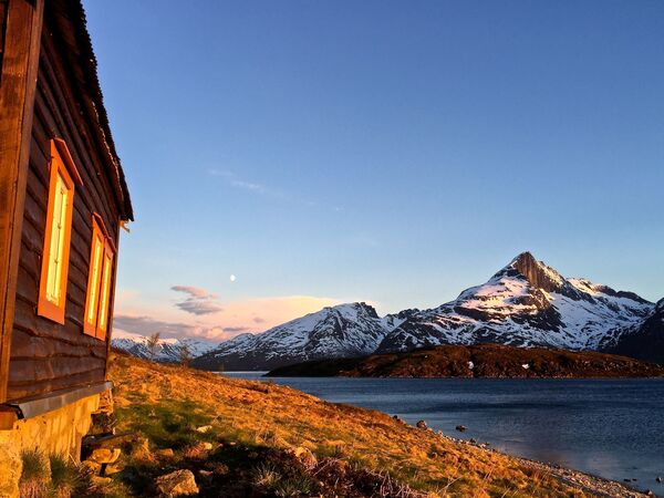 A cabin photographed under the midnight sun in spring 2015 in Tromsø, Norway.