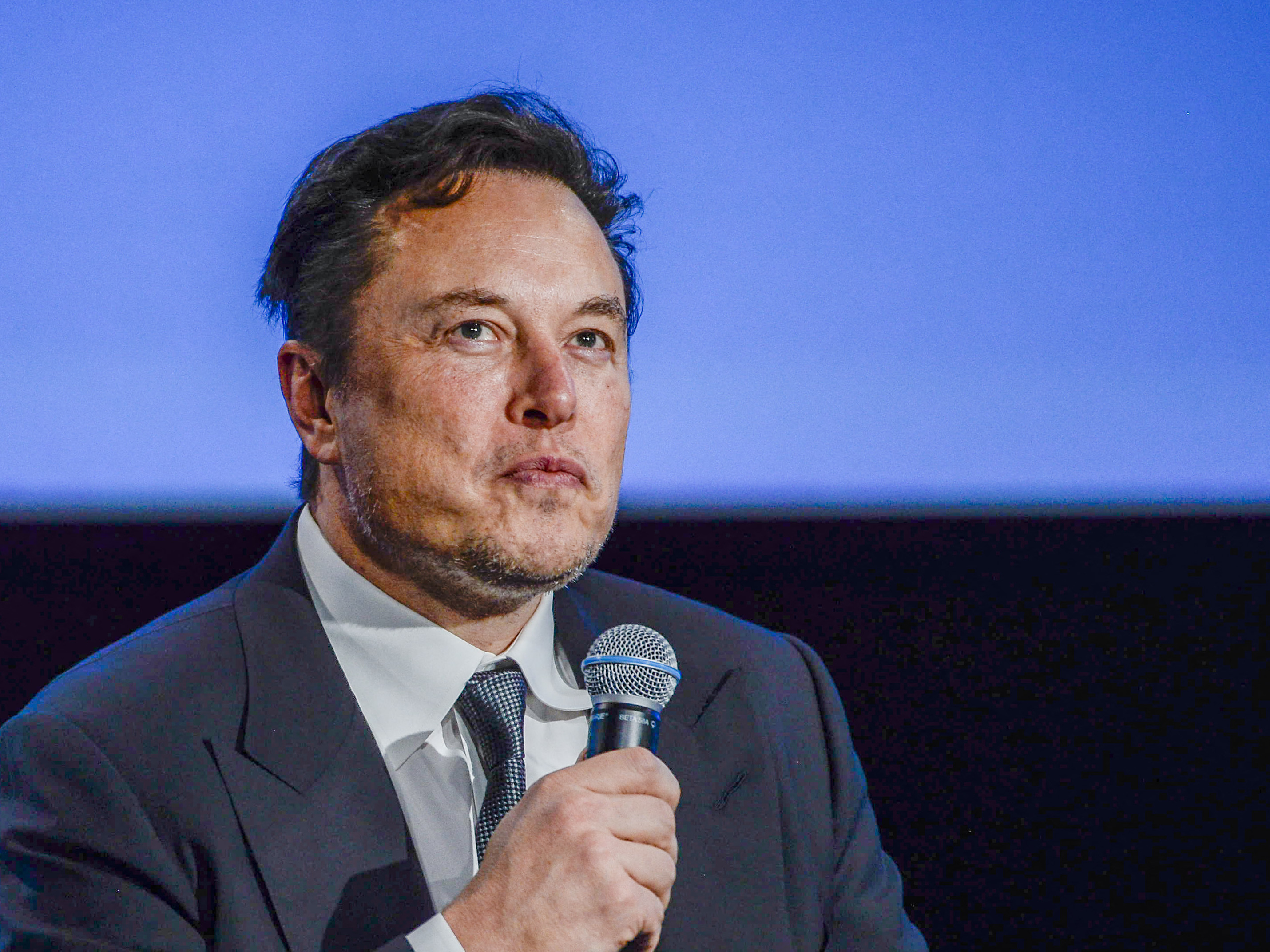 Owner Elon Musk has told remaining Twitter employees that they must decide whether to stay or go by Thursday afternoon. Here, Musk, as CEO of Tesla, speaks at a conference in Norway. (NTB/AFP via Getty Images)