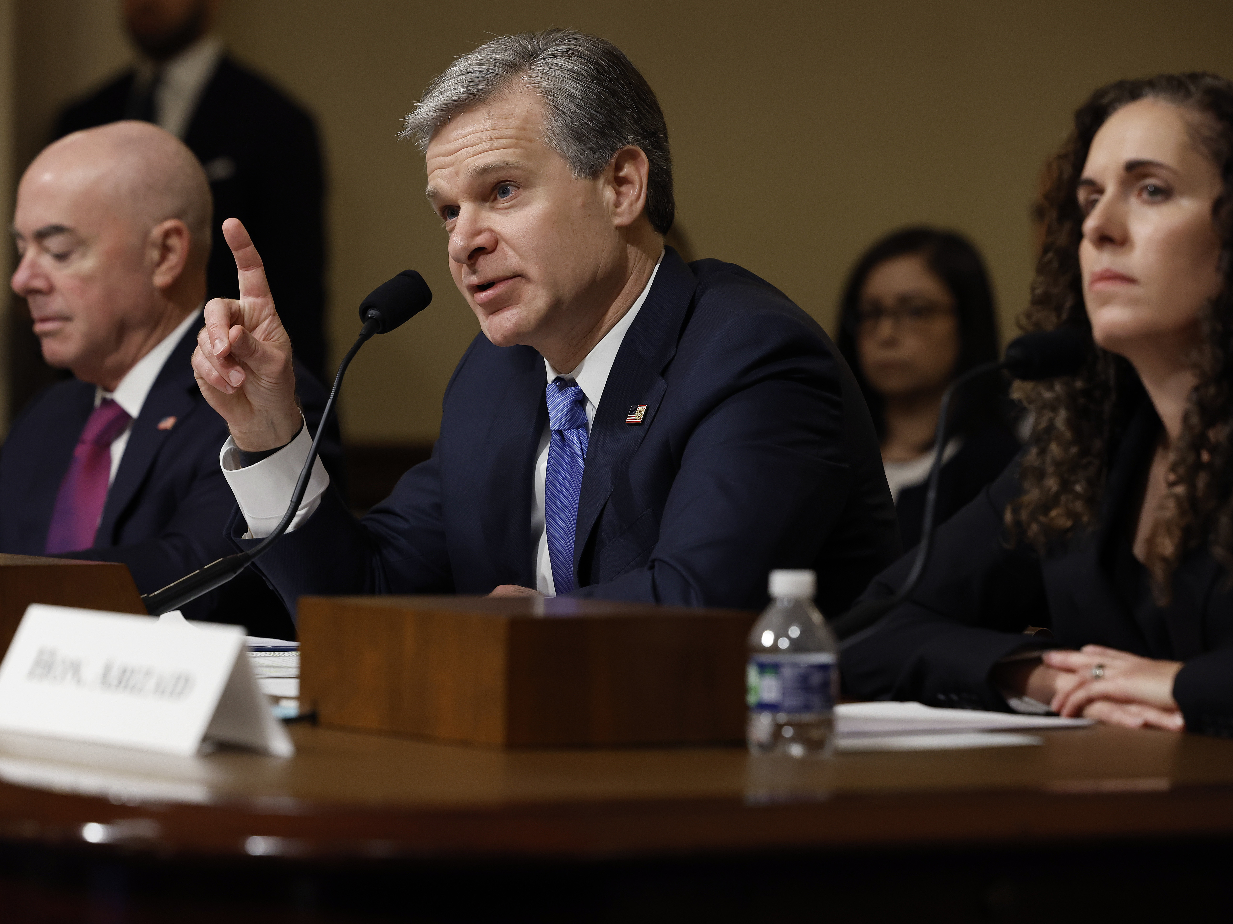 Federal Bureau of Investigation Director Christopher Wray testifies before the House Homeland Security Committee on Tuesday. Homeland Security Secretary Alejandro Mayorkas and National Counterterrorism Center Director Christine Abizaid were also there to discuss threats to the U.S. (Getty Images)