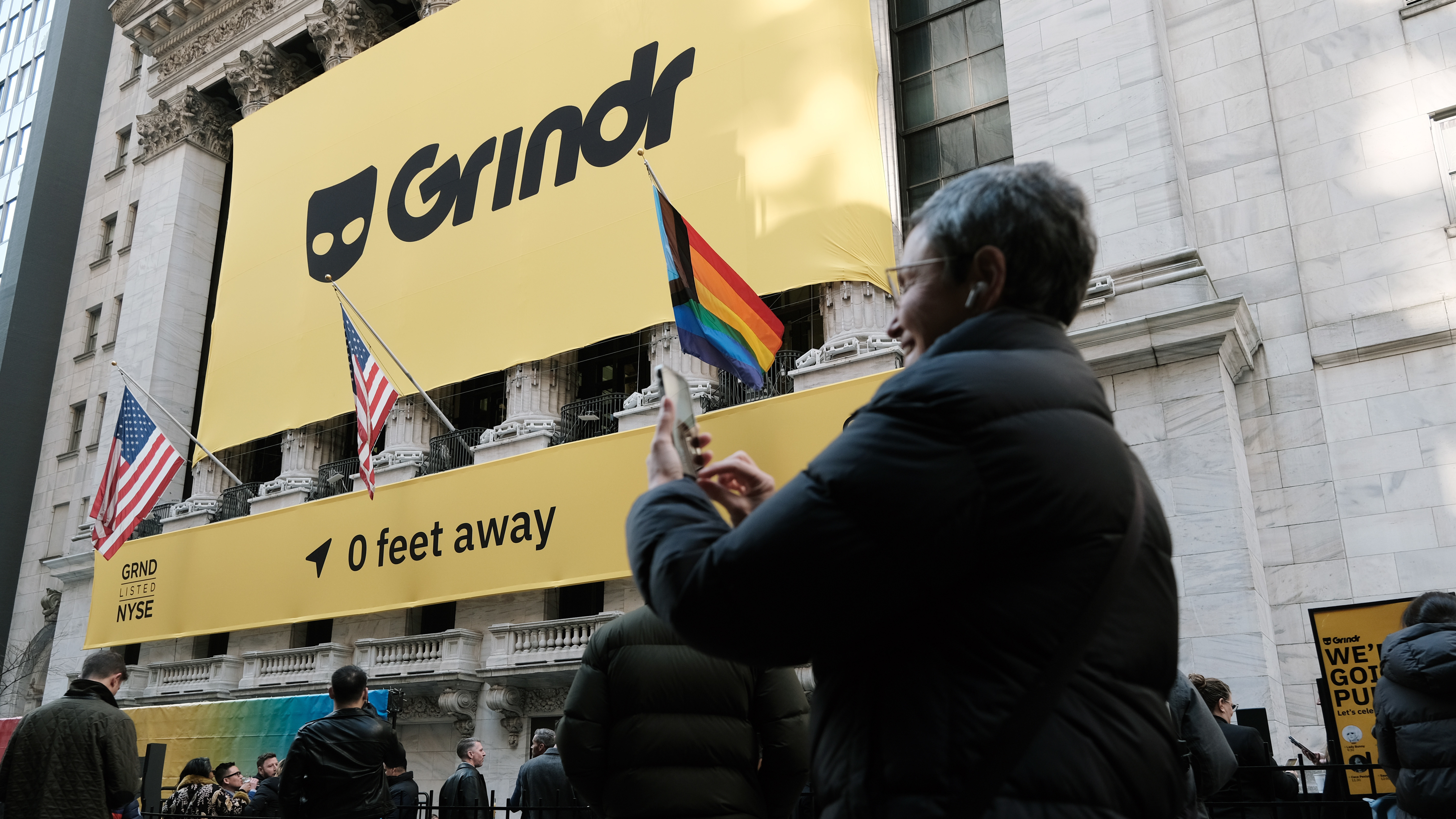 Grindr puts on a public show outside of the New York Stock Exchange (NYSE) as the company goes public following its merger with special purpose acquisition company (SPAC) Tiga Acquisition Corp. on November 18, 2022 in New York City.