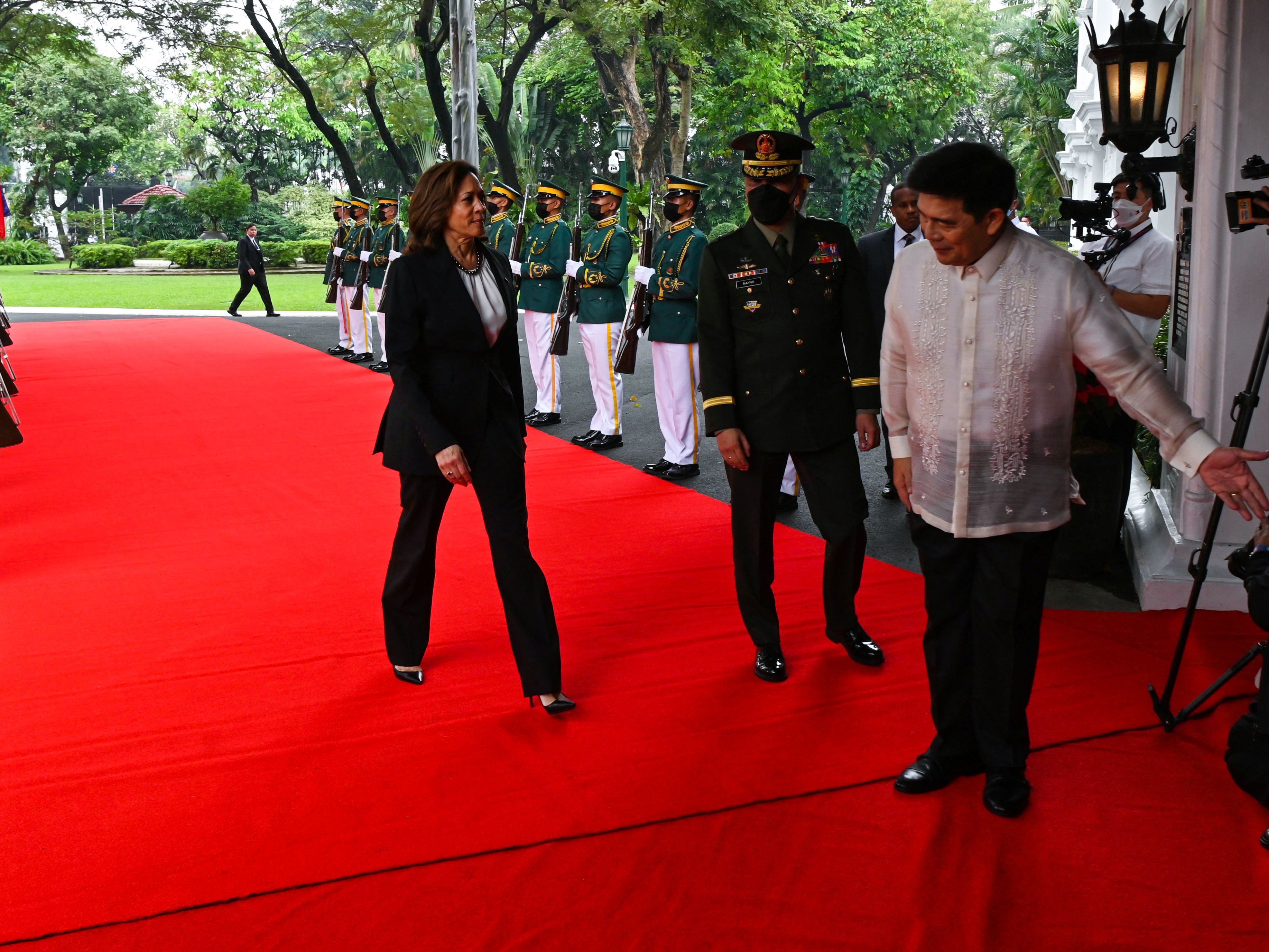 Philippines President Ferdinand Marcos Jr., right, welcomes Vice President Harris to Malacanang Palace in Manila on Nov. 21, 2022. (AFP via Getty Images)