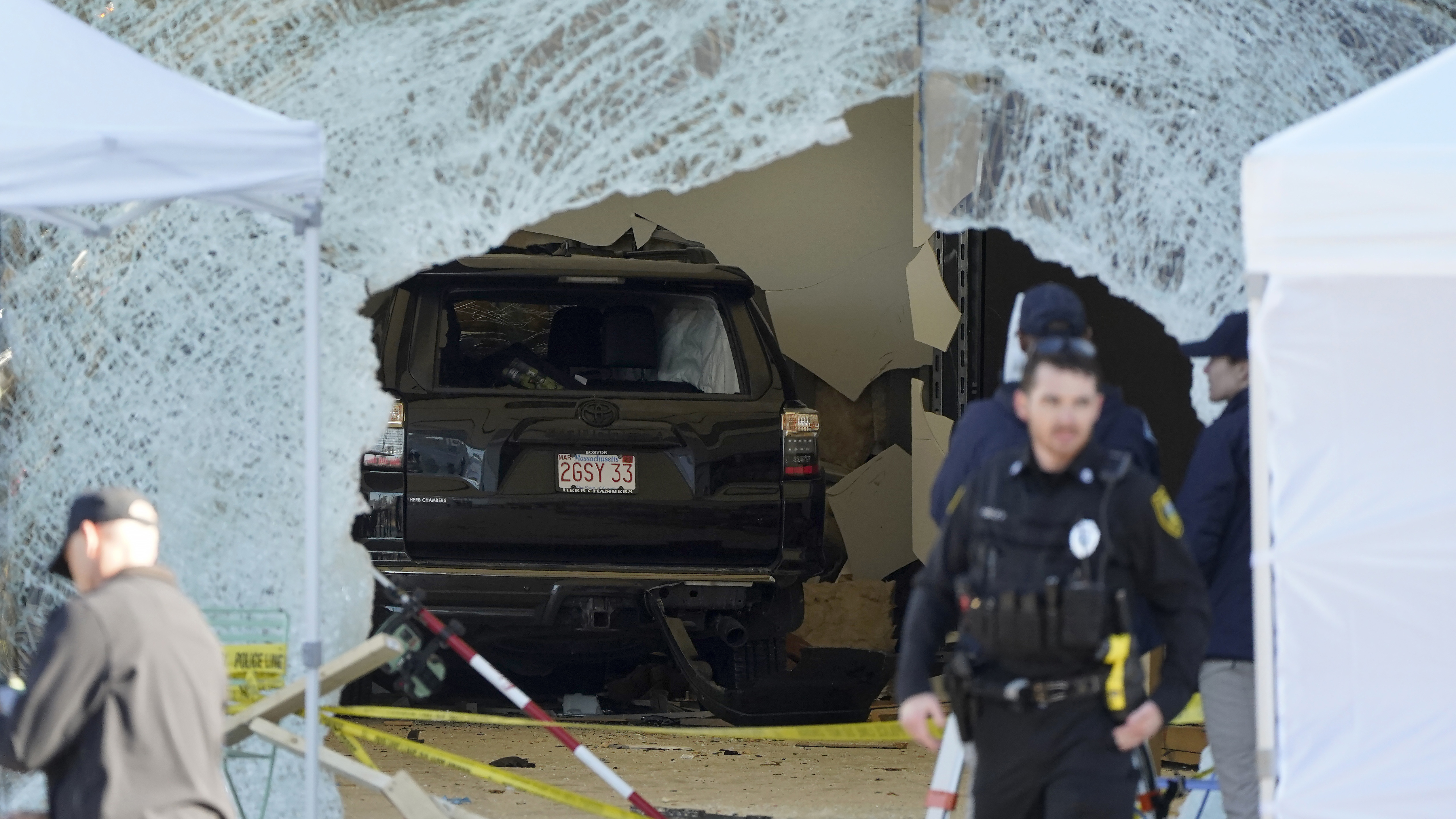 1 dead, 16 injured after an SUV slammed through a Massachusetts Apple Store