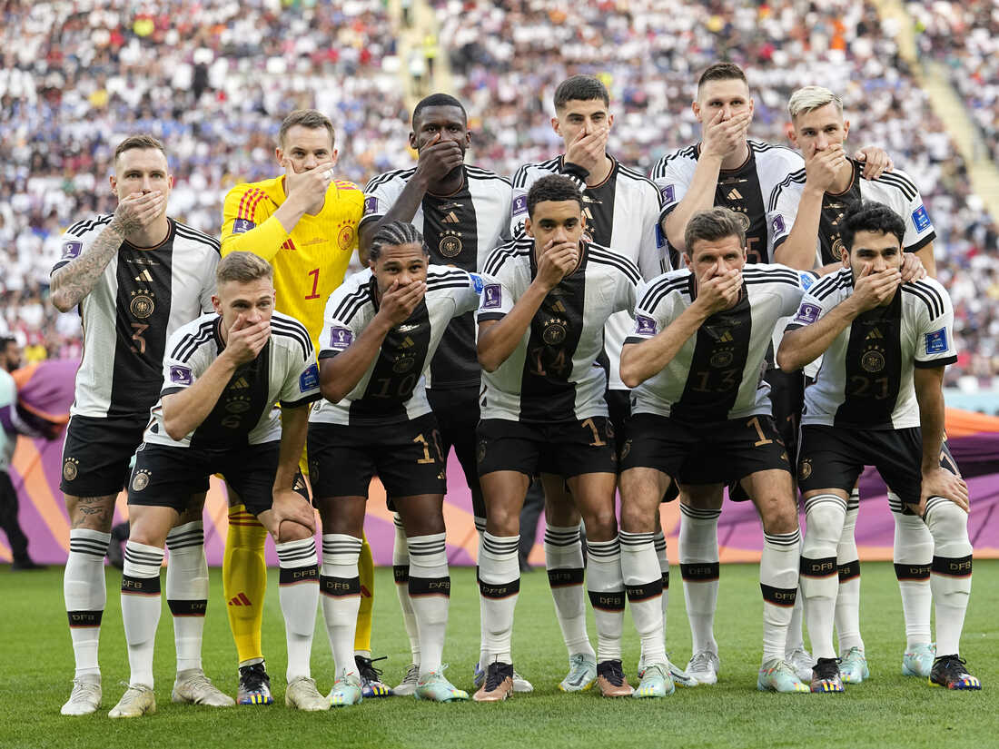 German players cover their mouths at the World Cup to protest FIFA NPR