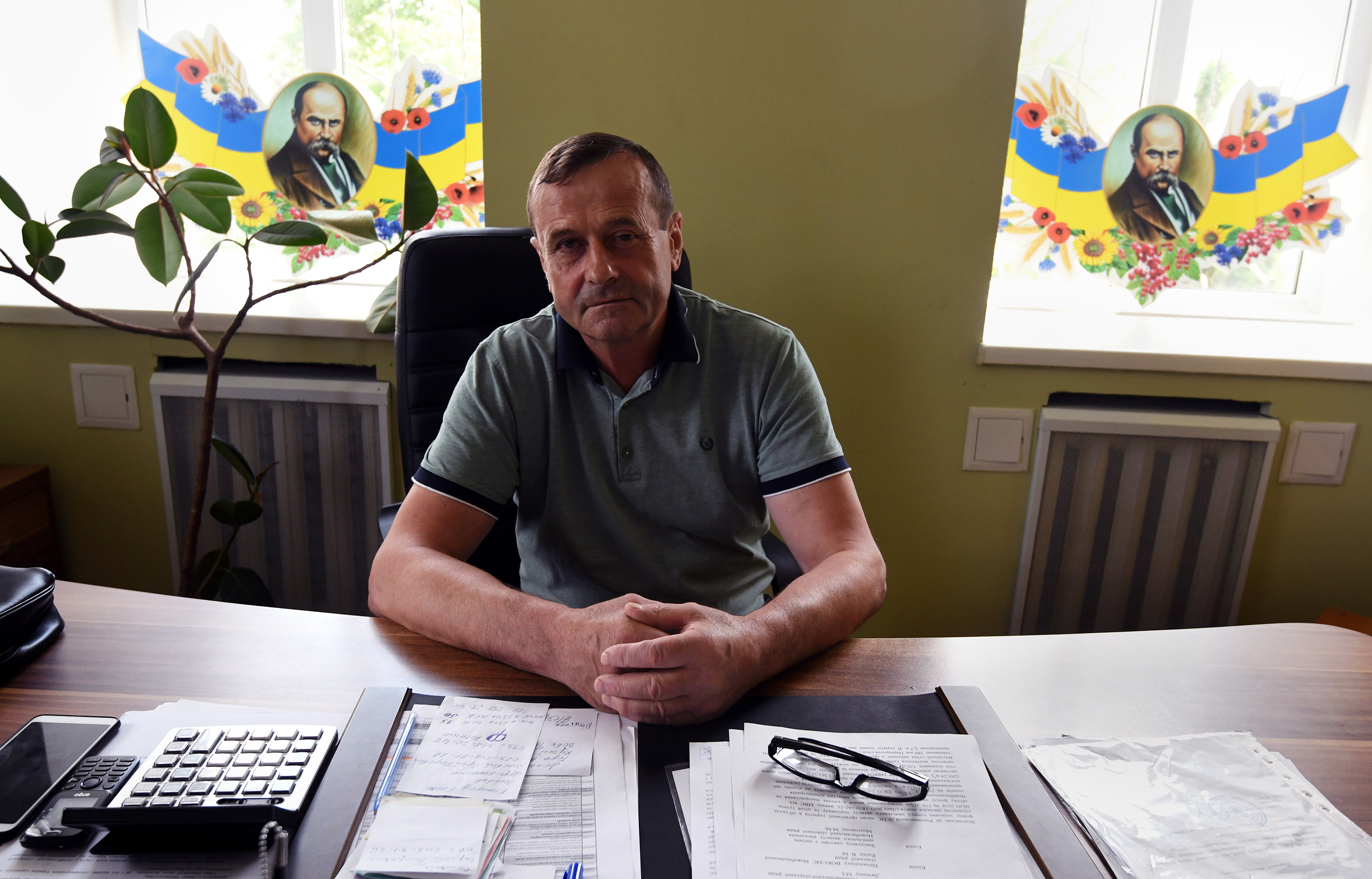 There have been 50,000 alleged war crimes in Ukraine. We worked to solve one 8 Mykola Dyachenko is a local administrator in Nova Basan. There is still a bullet hole in his office from the Russian invasion.