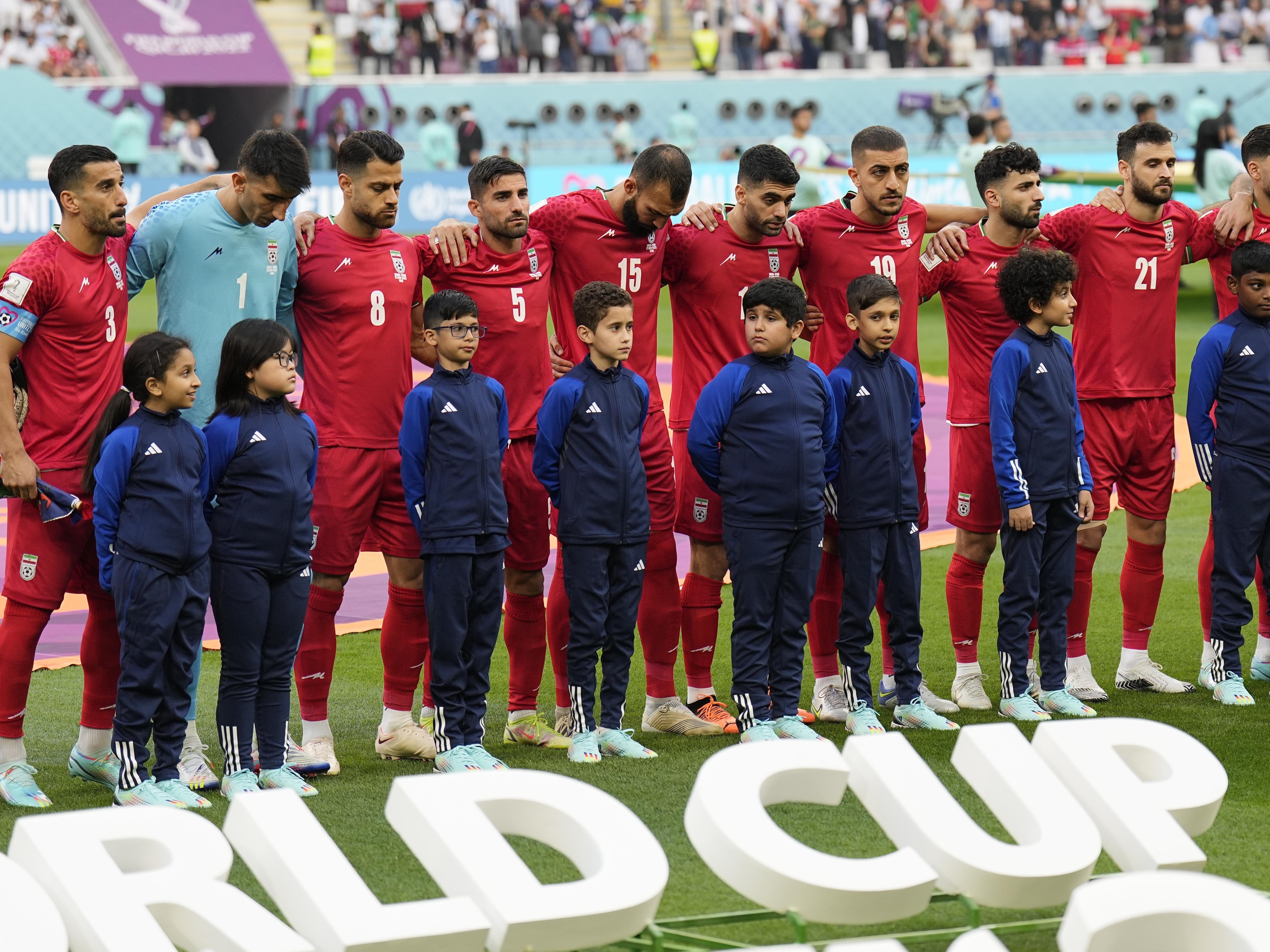 Iran's soccer team silent during national anthem in Qatar in support of  protesters back home