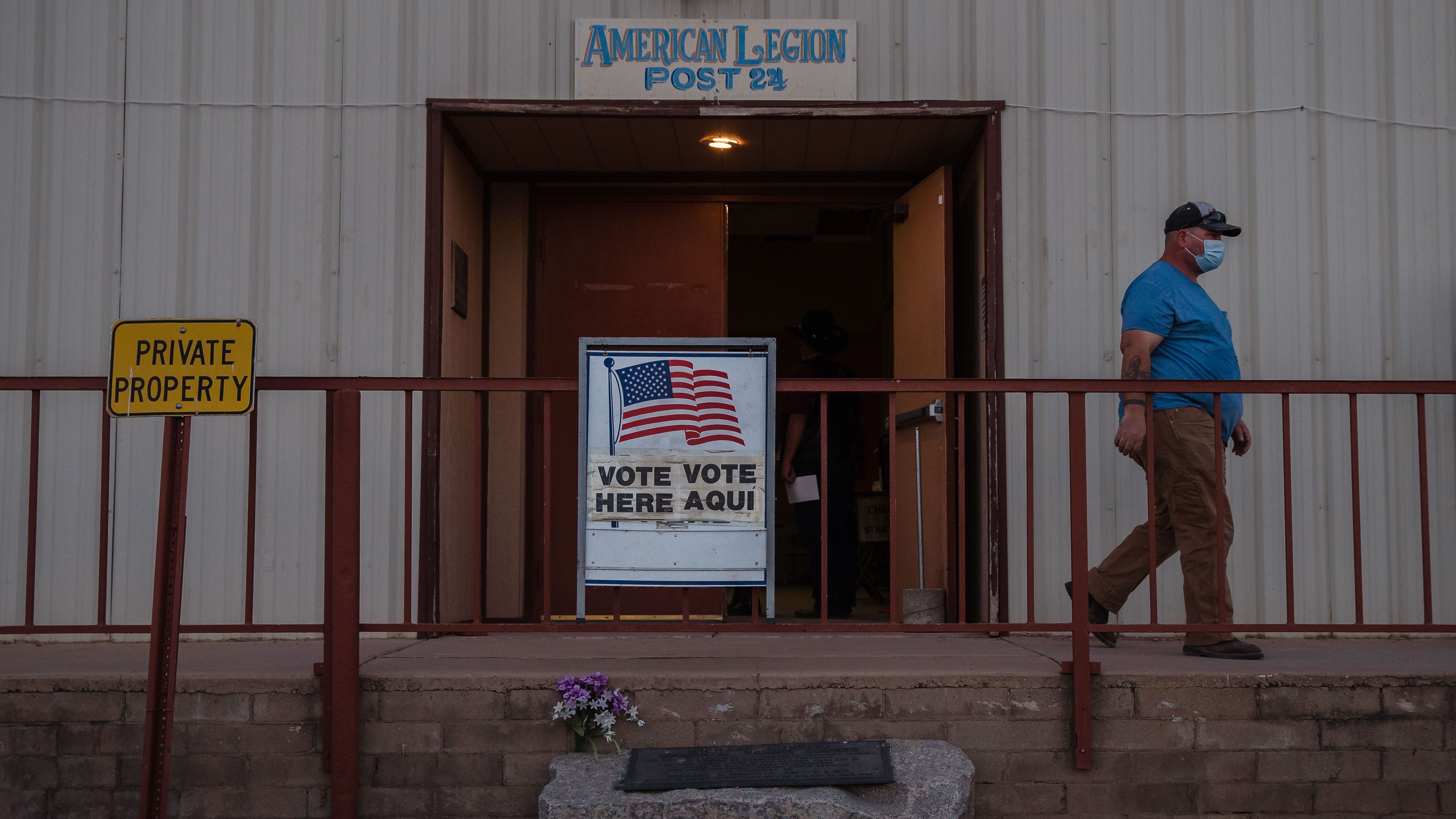 A man walks out after casting his vote on Election Day 2020 in Tombstone, Ariz., in Cochise County. (AFP via Getty Images)