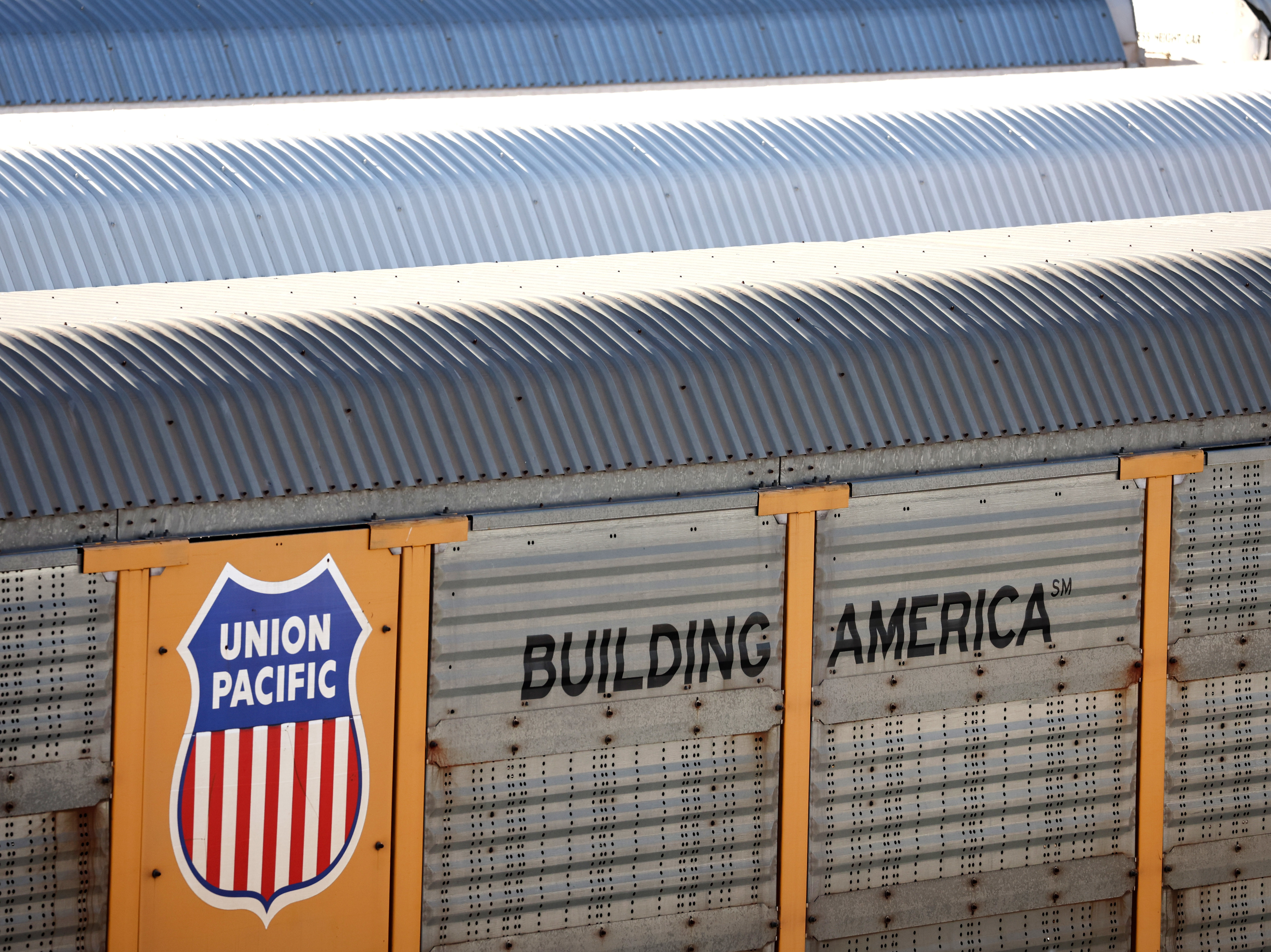Freight rail cars sit in a rail yard in Wilmington, California, on November 22, 2022. This week, President Biden urged Congress to pass legislation to prevent a rail strike that could have brought trains to a halt nationwide. (Getty Images)