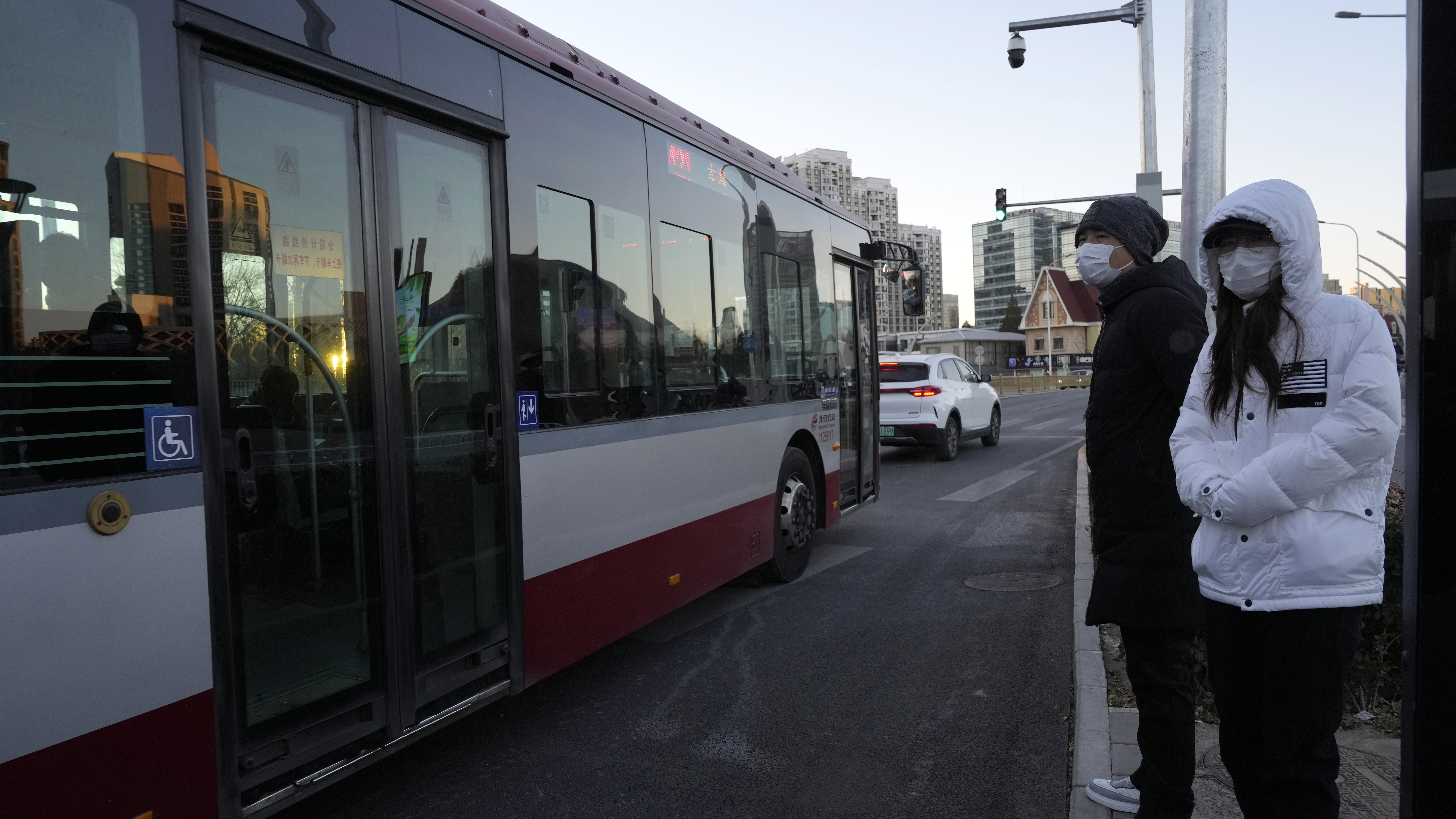 Beijing and other cities in China end required COVID-19 tests for public transit