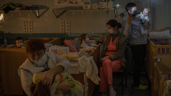Hospital staff take care of orphaned children at the children