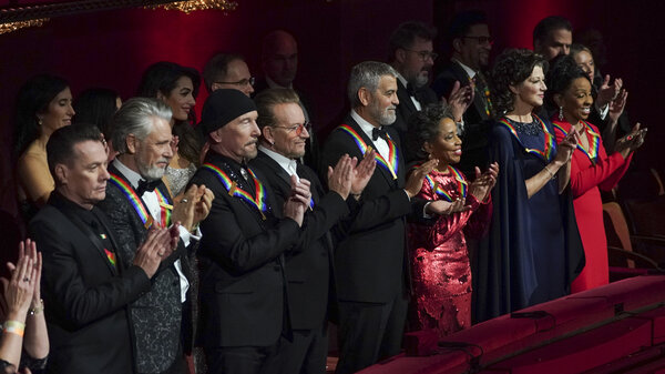 Kennedy Center honorees U2 (Larry Mullen Jr., Adam Clayton, The Edge, and Bono), George Clooney, Tania León, Amy Grant, and Gladys Knight.