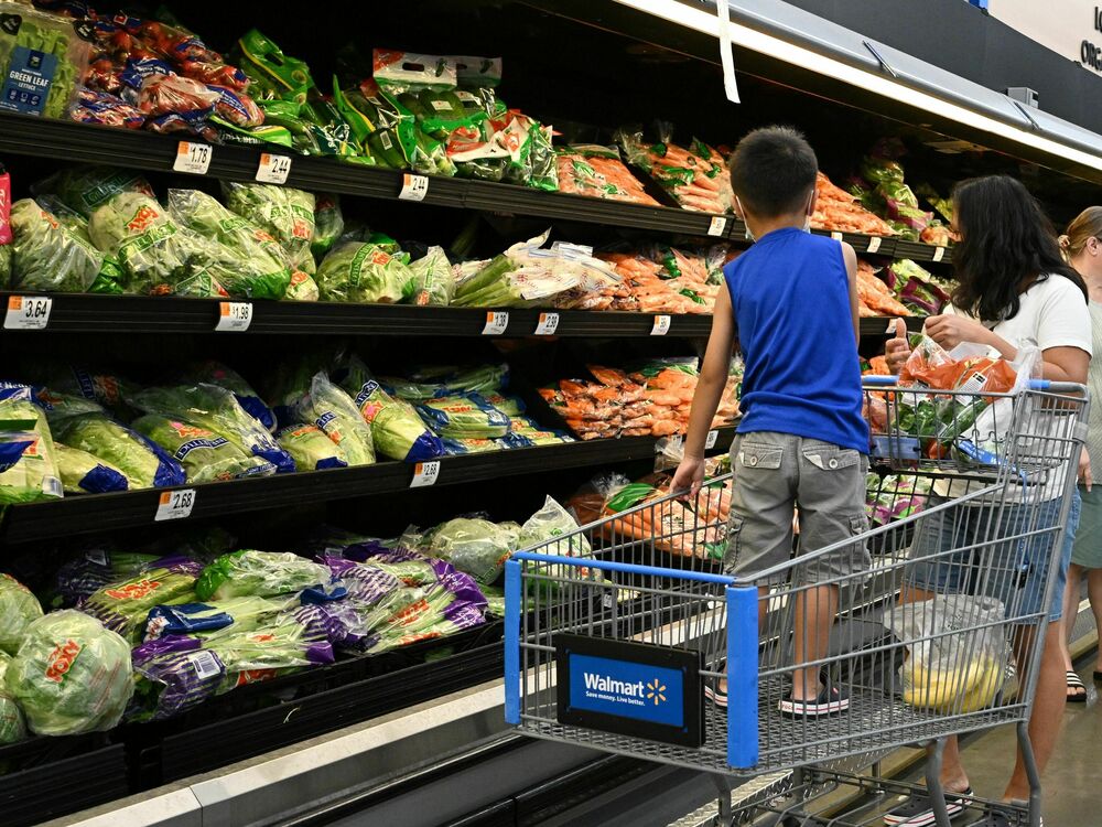 Consumers shop in the produce section of a Walmart store in Burbank, Calif., on August 15, 2022. Produce prices have been rising recently, the latest area hit by inflation. (AFP via Getty Images)