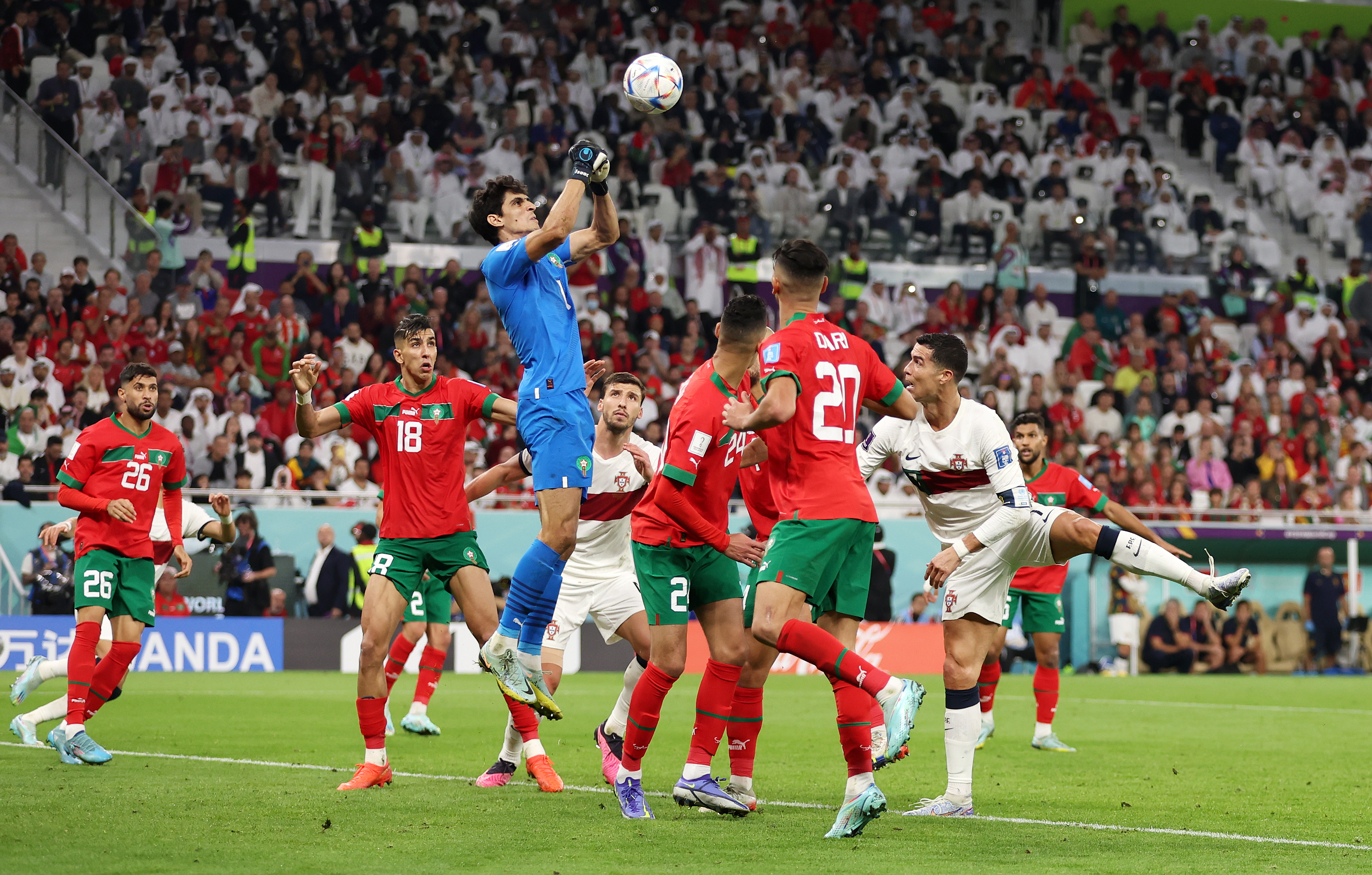 Yassine Bounou of Morocco makes a save during the the World Cup quarterfinal between Morocco and Portugal. Goalkeepers have powered the final four teams left in the tournament.