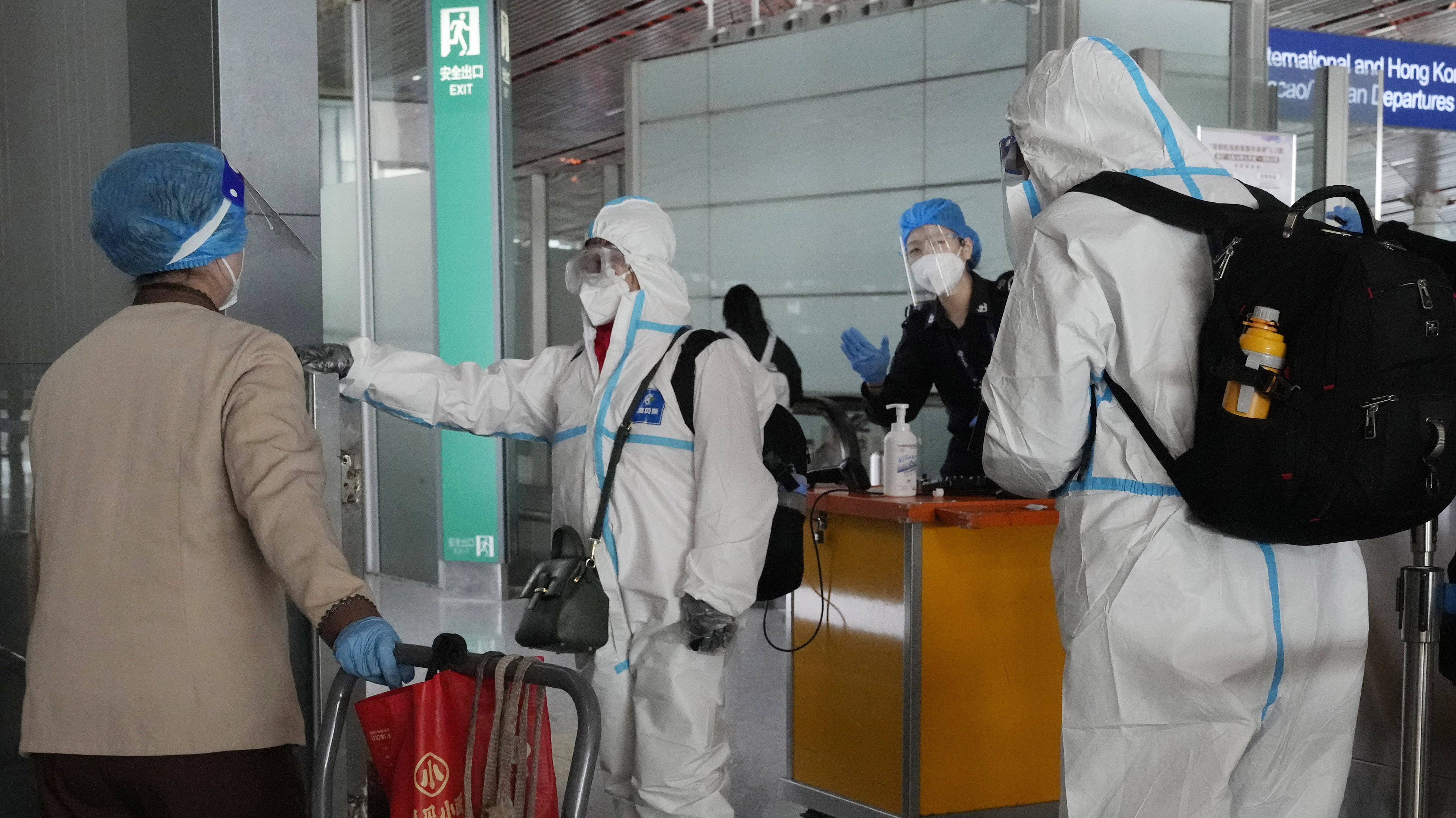 China reduces COVID-19 case number reporting as virus surges