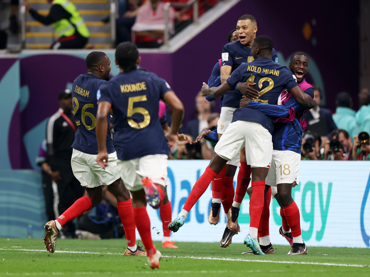 Randal Kolo Muani of France celebrates with teammates after scoring the team's second goal during the FIFA World Cup Qatar 2022 semi final match between France and Morocco at Al Bayt Stadium on December 14, 2022 in Al Khor, Qatar.