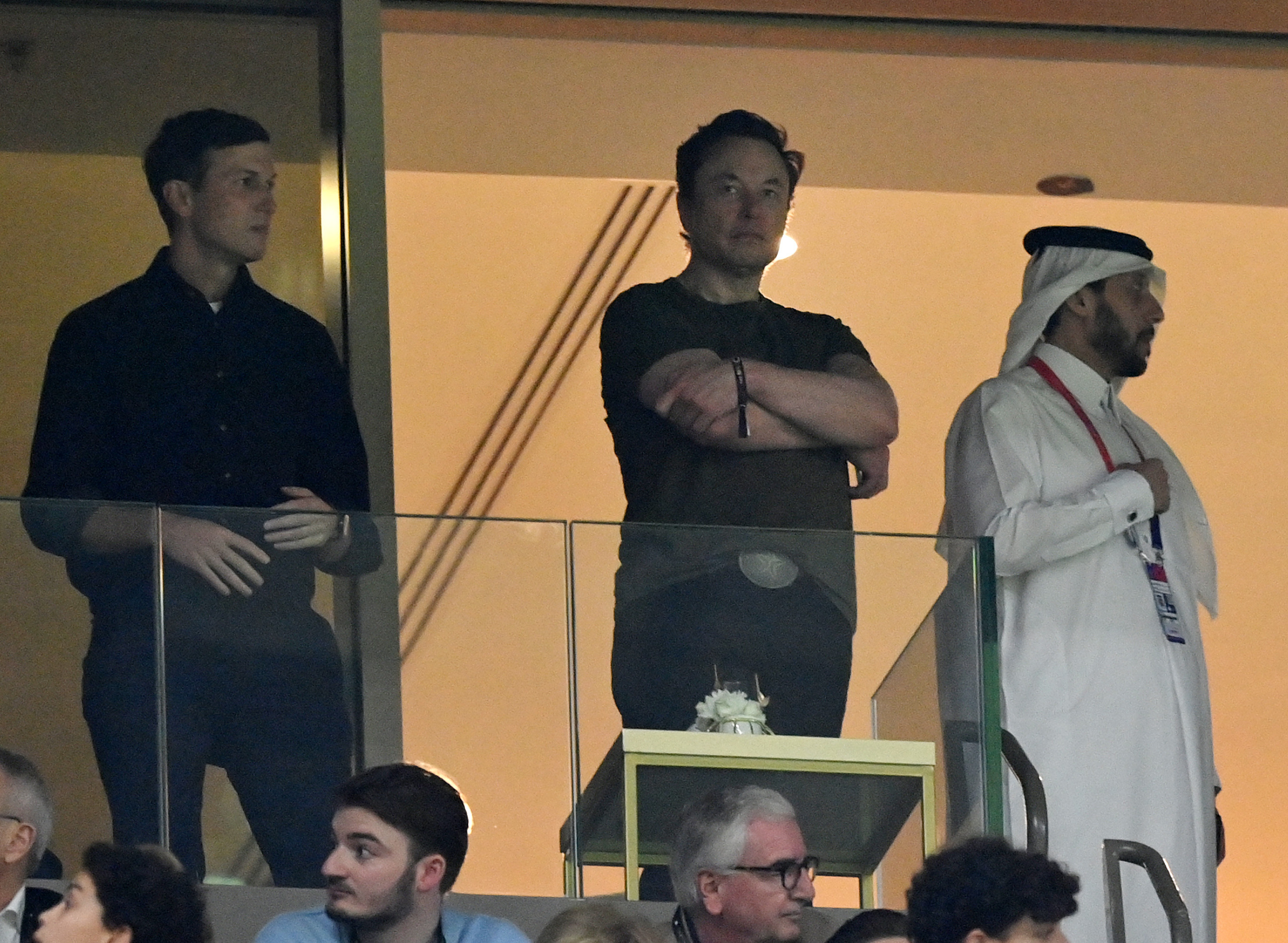 Elon Musk (center), standing with former President Trump's son-in-law Jared Kushner (left) look on during the World Cup Final between Argentina and France in Qatar on December 18.