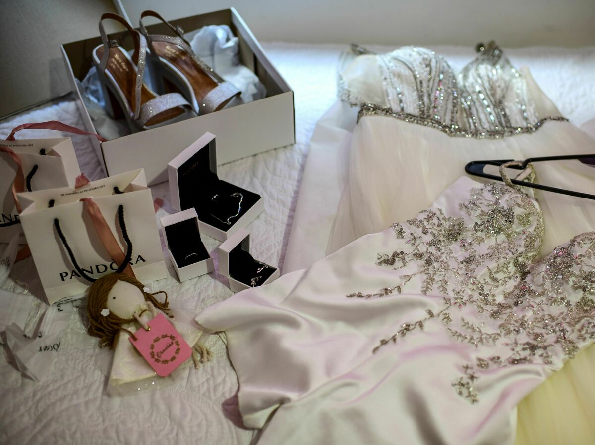 A view of Argentinian Mia Minutillo's quinceanera dresses, shoes and jewelry at her home in Buenos Aires, July 30, 2020. - The traditional Sweet-Fifteen - fifteenth birthday of Latin American girls - is a dream that teenagers cherish due to the cancellation or had to postpone pandemic.  (Photo by RONALDO SCHEMIDT/AFP) (Photo by RONALDO SCHEMIDT/AFP via Getty Images)