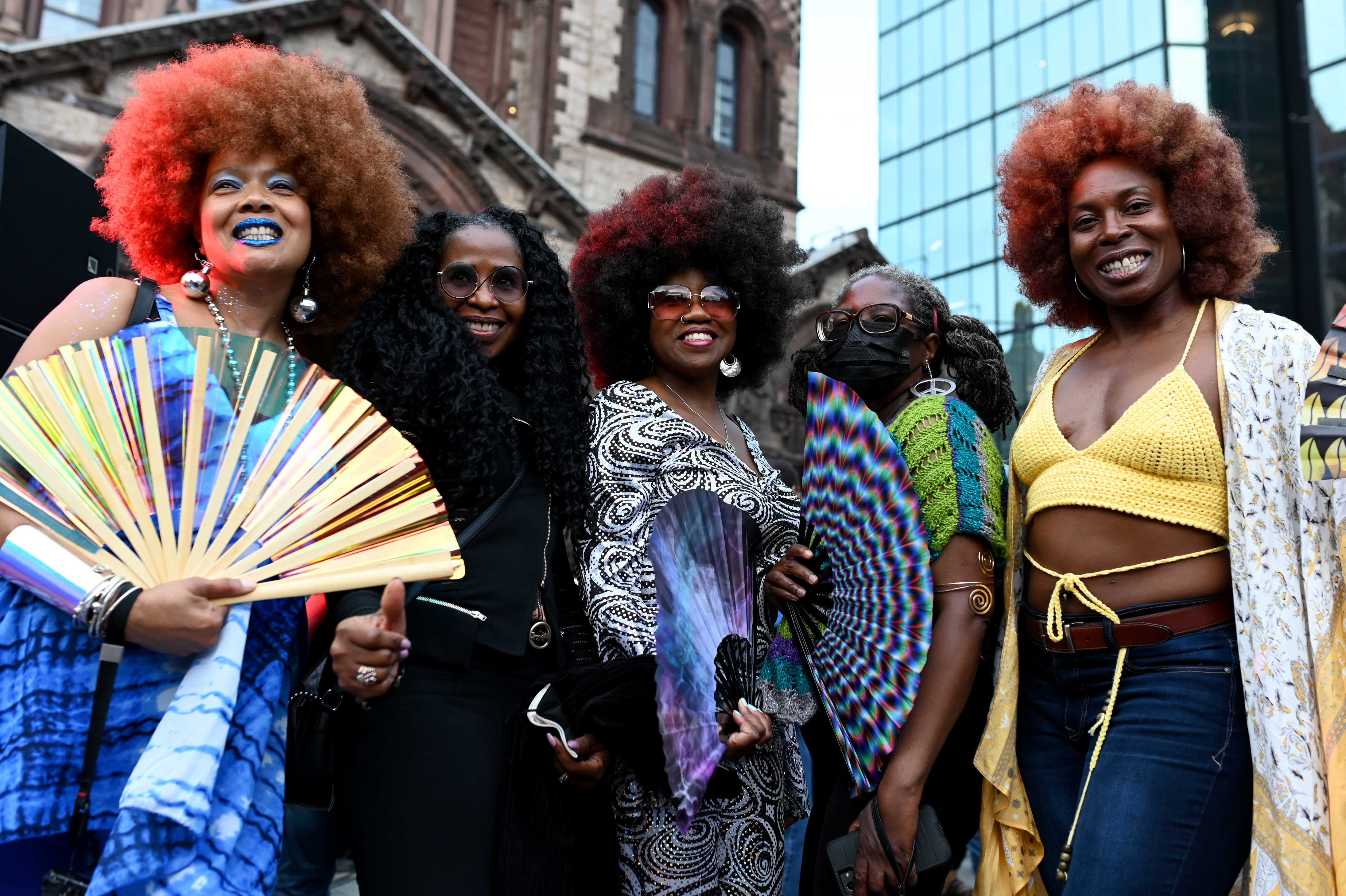 From left to right: Jacqueline Myers of Dorchester, Cynthia Sellers of Worcester, Carmen Calloway of San Diego and Angel Green of Boston pose for a photo at Boston's annual Donna Summer Disco Party in Copley Square on June 16, 2022. Full story here.