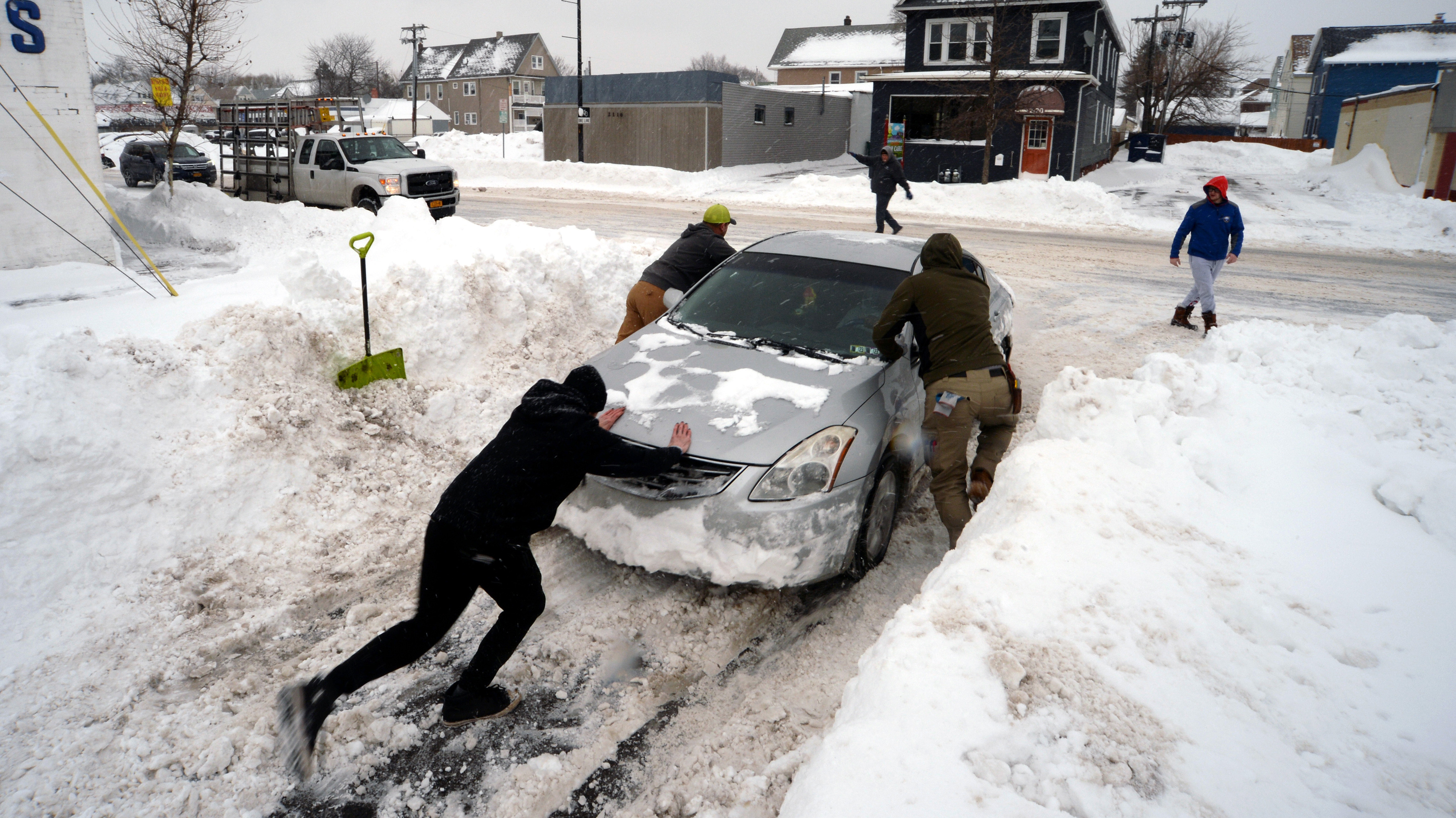A nearly week-long driving ban is lifted in Buffalo as temperatures rise 