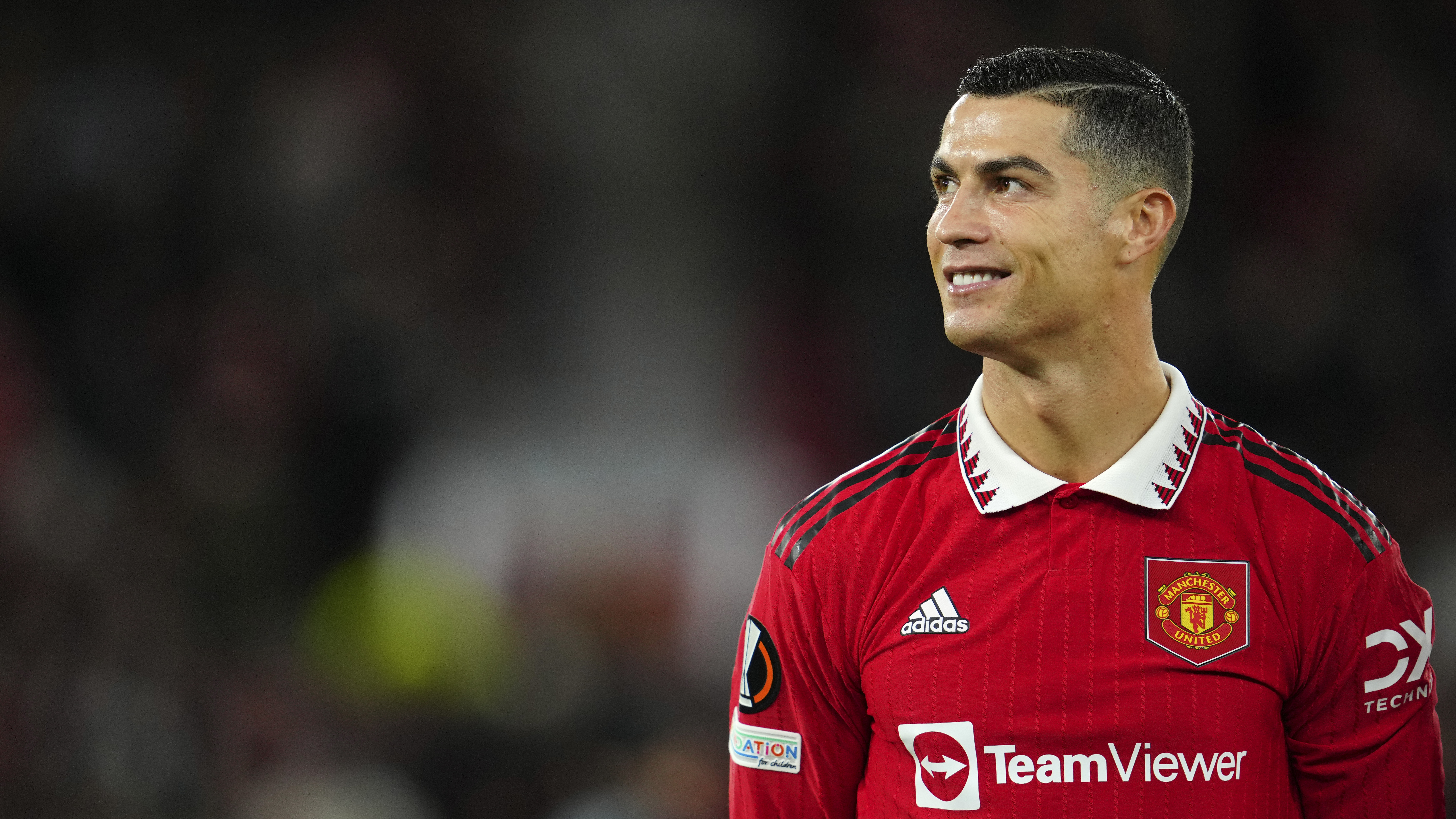 Cristiano Ronaldo smiles before the start of Manchester United