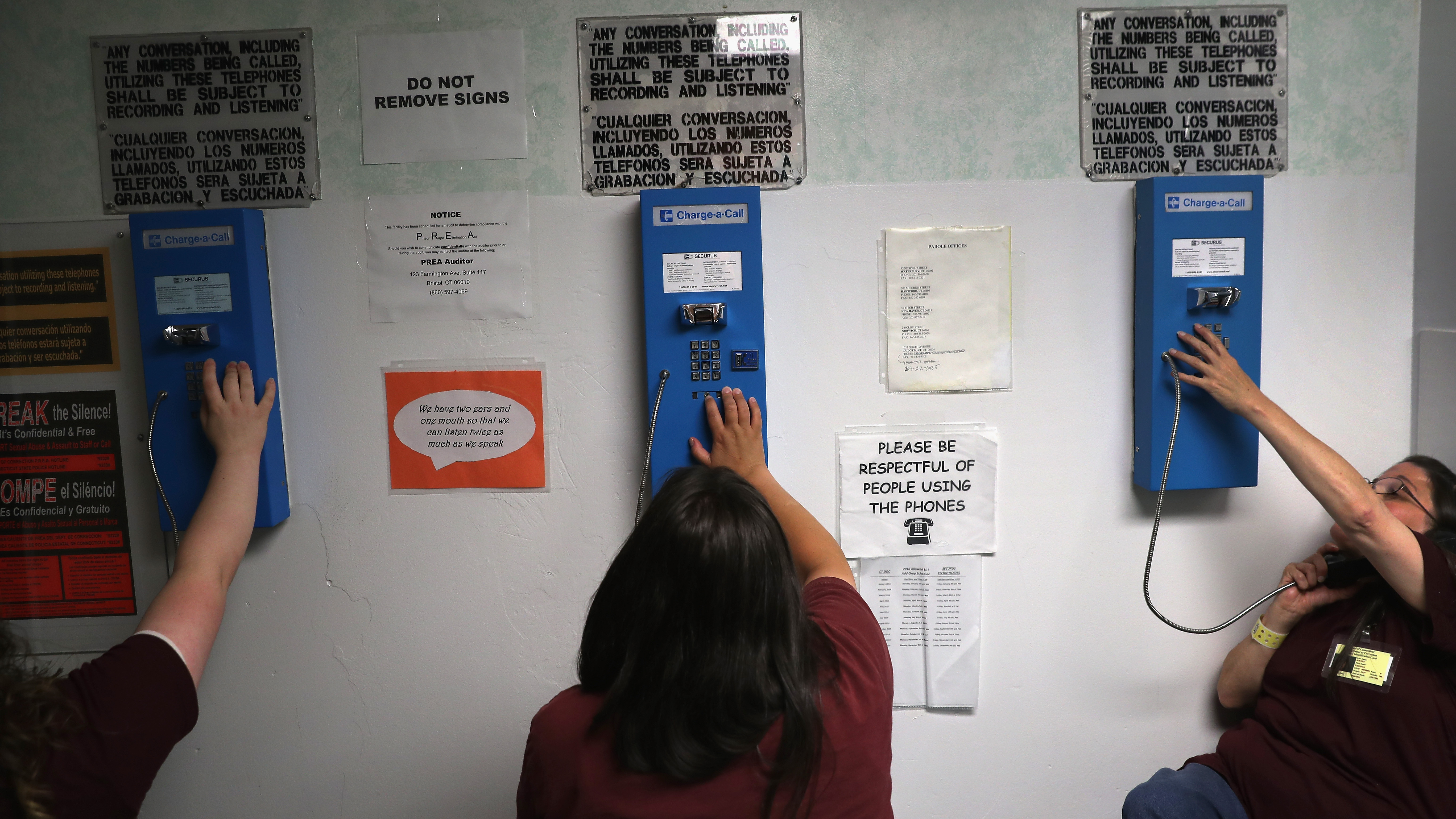 Prison inmates make one of their daily allotment of six phone calls at the York Community Reintegration Center.