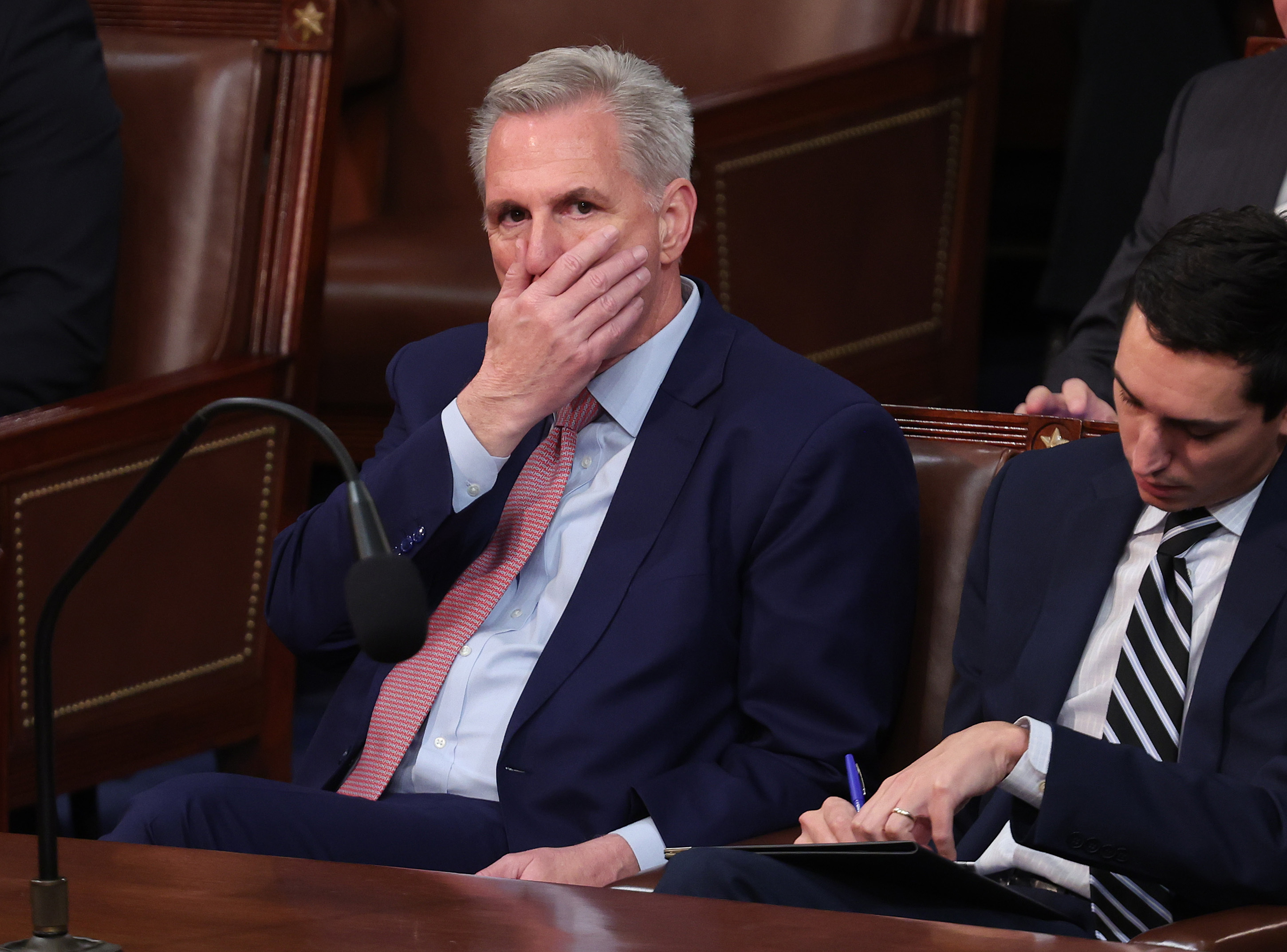 U.S. House Minority Leader Kevin McCarthy (R-CA) reacts as Representatives cast their votes for Speaker of the House on the first day of the 118th Congress in the House Chamber of the U.S. Capitol Building on January 03, 2023 in Washington, DC. (Photo by Win McNamee/Getty Images)