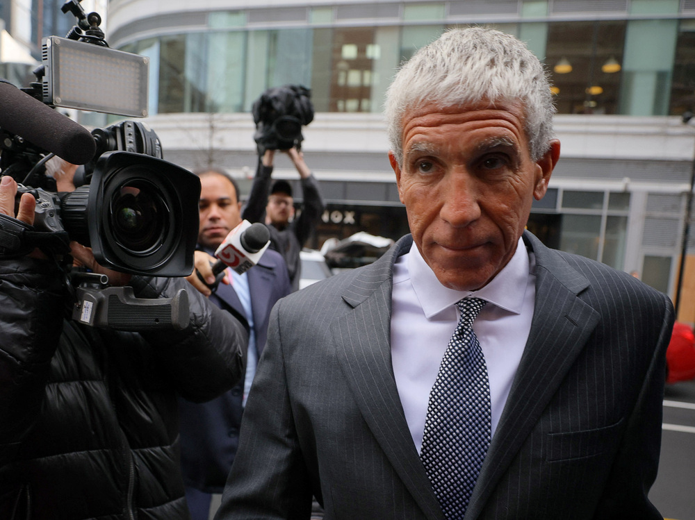 William "Rick" Singer arrives Wednesday at the federal courthouse in Boston. He was sentenced to 3 1/2 years in prison and ordered to pay more than $19 million in restitution and forfeitures. (Reuters)