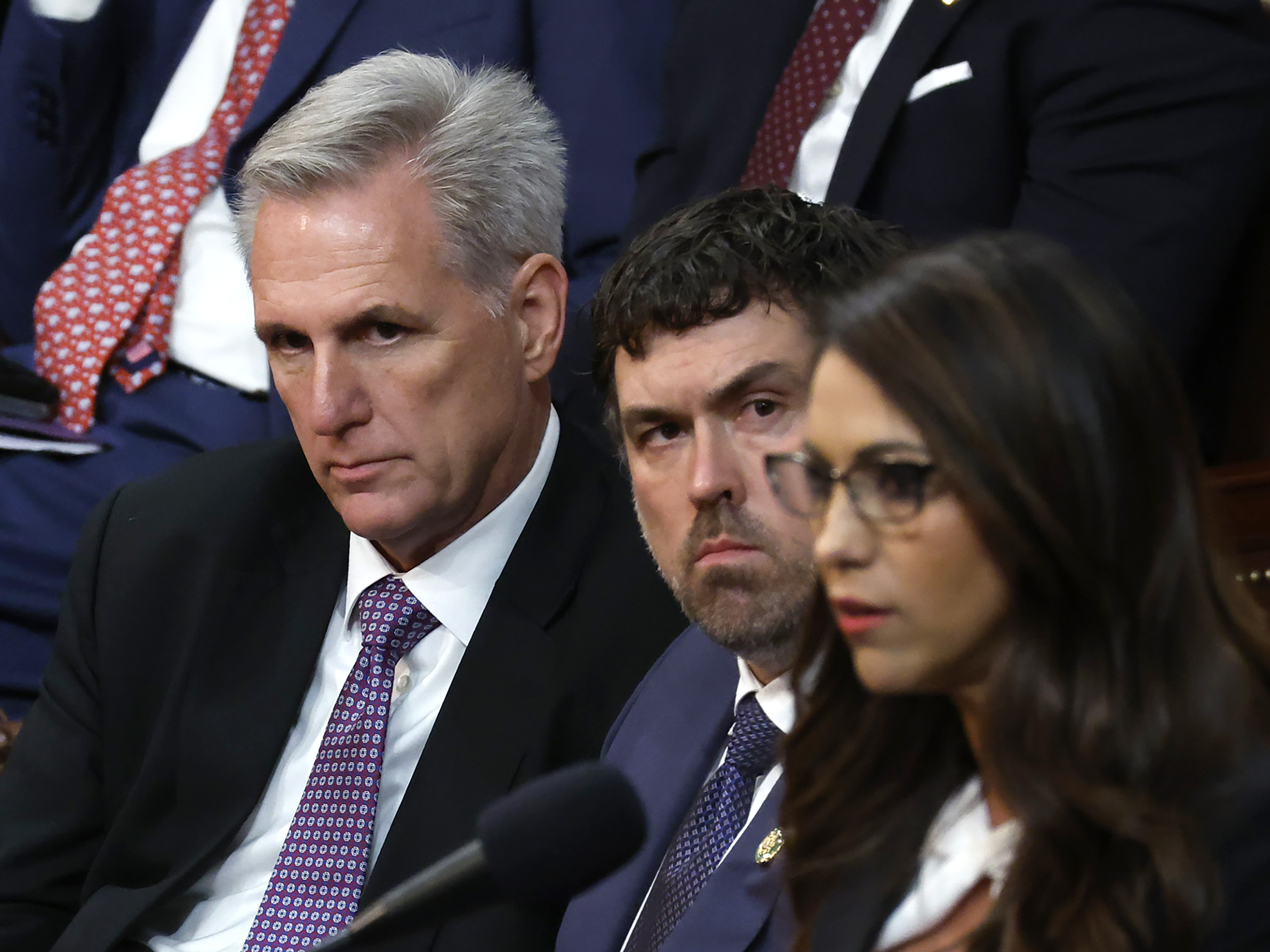 WASHINGTON, DC - JANUARY 04: U.S. House Republican Leader Kevin McCarthy (L) listens as Rep.-elect Lauren Boebert (R-Colo.) (R) delivers remarks in the House Chamber during the second day of elections for Speaker of the House at the U.S. Capitol Building on January 04, 2023 in Washington, DC. (Photo by Chip Somodevilla/Getty Images)
