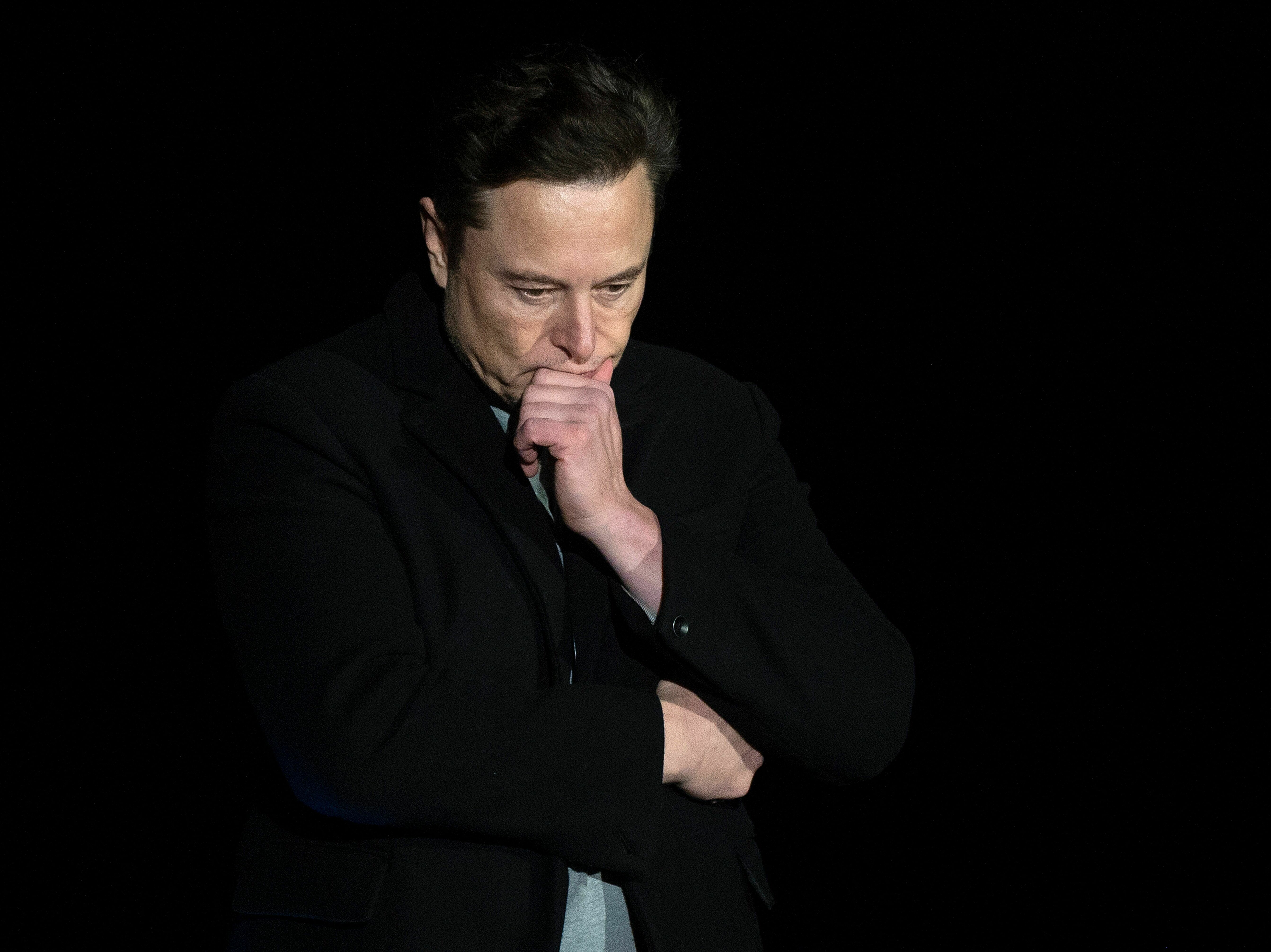 Tesla shares have dropped over the past year, partly because investors worry that CEO Elon Musk is too distracted with his takeover of Twitter. (AFP via Getty Images)