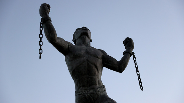The Emancipation Statue symbolizing the breaking of the chains of slavery at the moment of emancipation is shown on November 16, 2021 in Bridgetown, Barbados.
